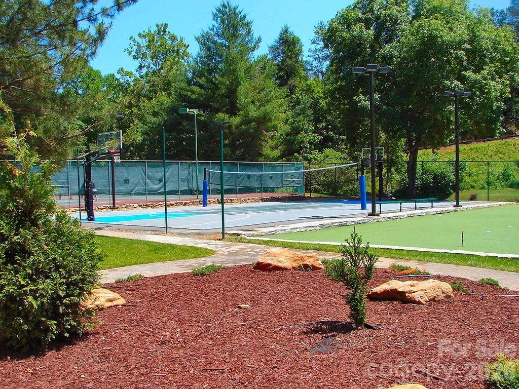 This property features extensive amenities at Rumbling Bald, offering a premier lifestyle experience. - 179 Rock Spring Road, Lake Lure
