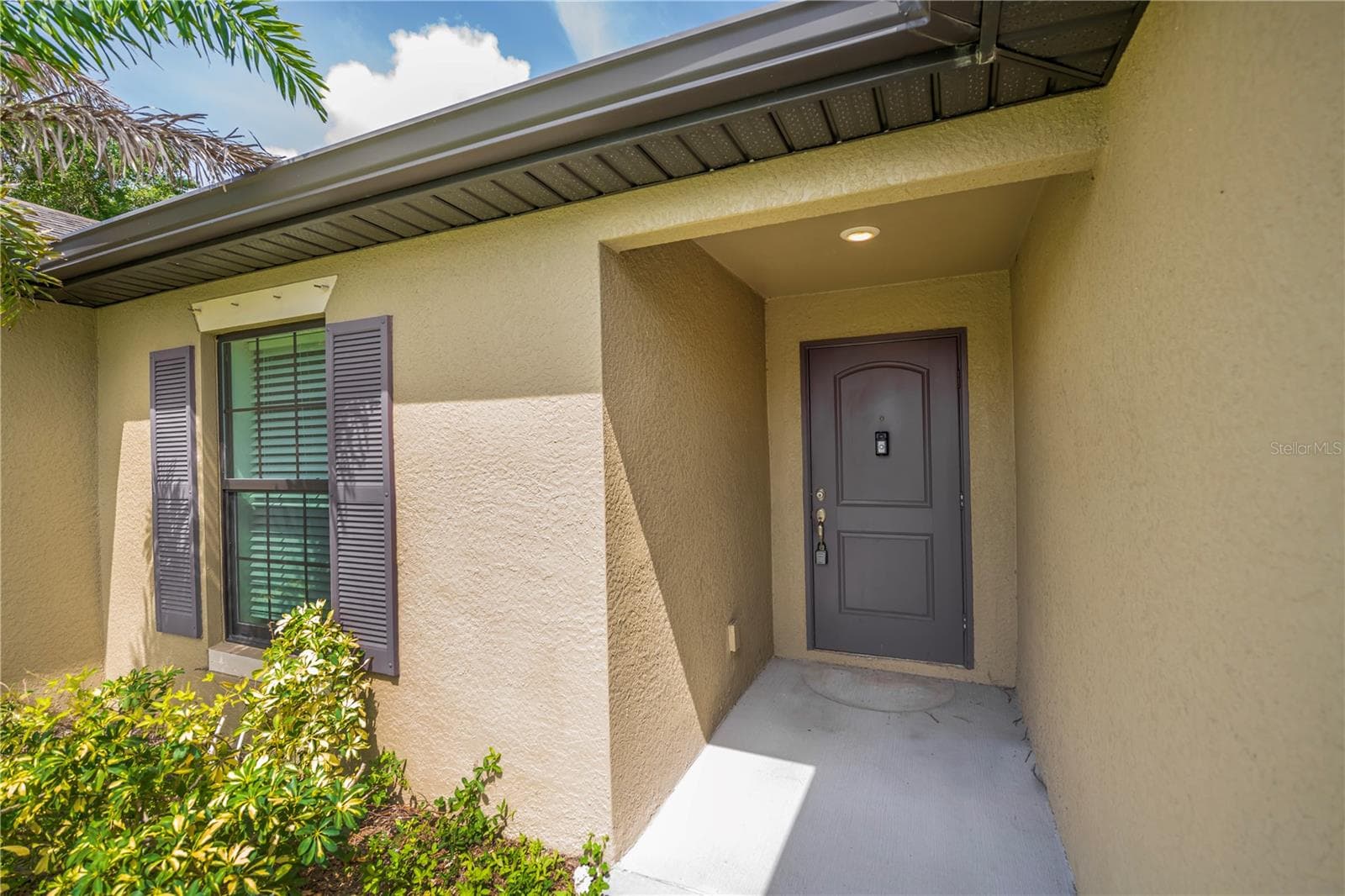 Covered Front Entry with Mature Landscaping - 2555 ATWATER DR, NORTH PORT