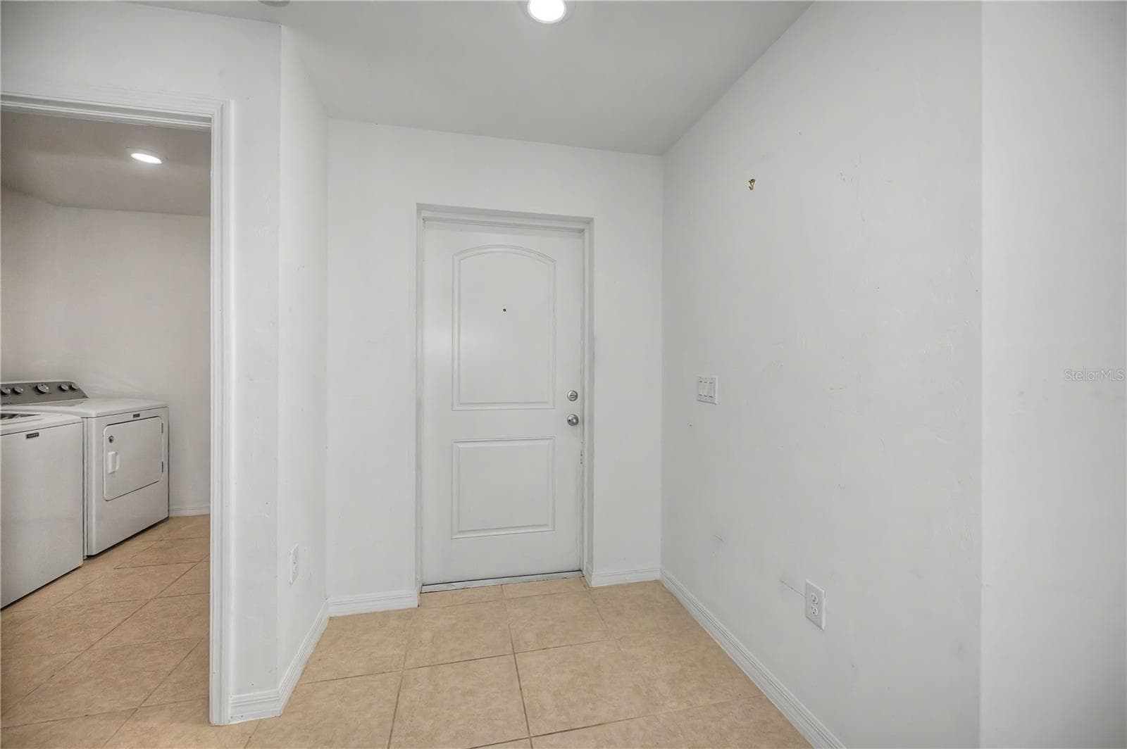 Interior Entryway with Tile Flooring and Nearby Laundry Access - 2555 ATWATER DR, NORTH PORT