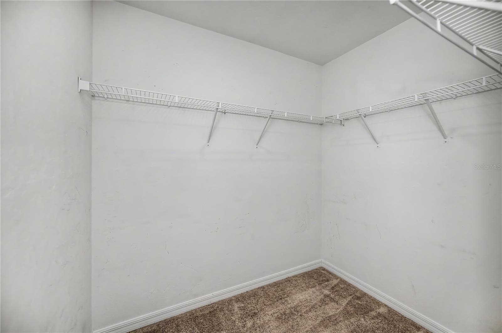 Large Primary Suite Closet with Storage Shelving - 2555 ATWATER DR, NORTH PORT