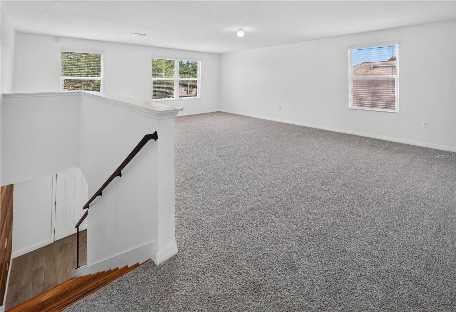 Stairs lead to loft 2nd floor - 9637 TRONCAIS CIR, THONOTOSASSA