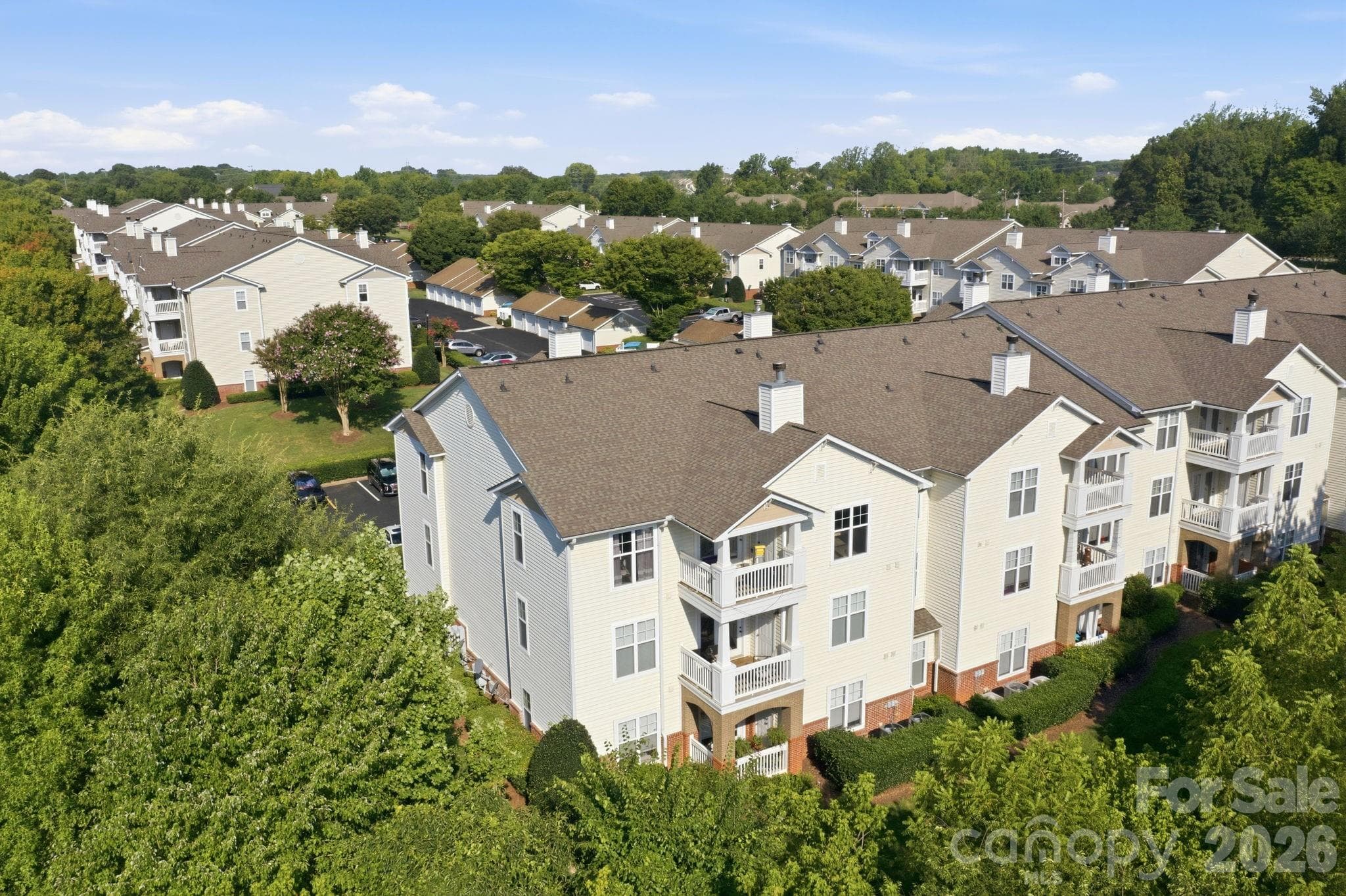Top Floor Corner Unit surrounded by large, mature, trees - 17257 Doe Valley Court, Cornelius