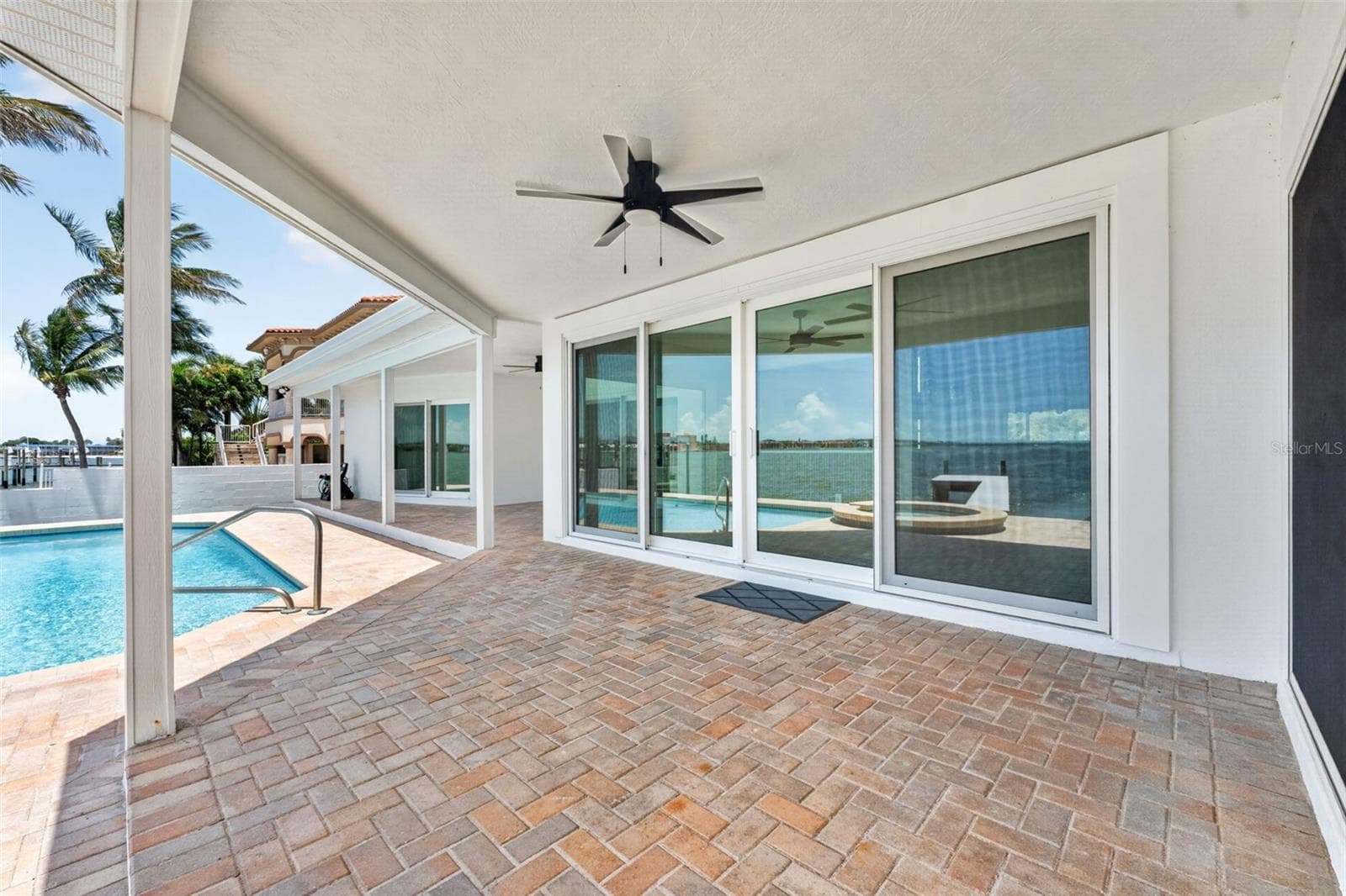 Paver pool deck was just resealed. - 2936 68TH AVE S, ST PETERSBURG
