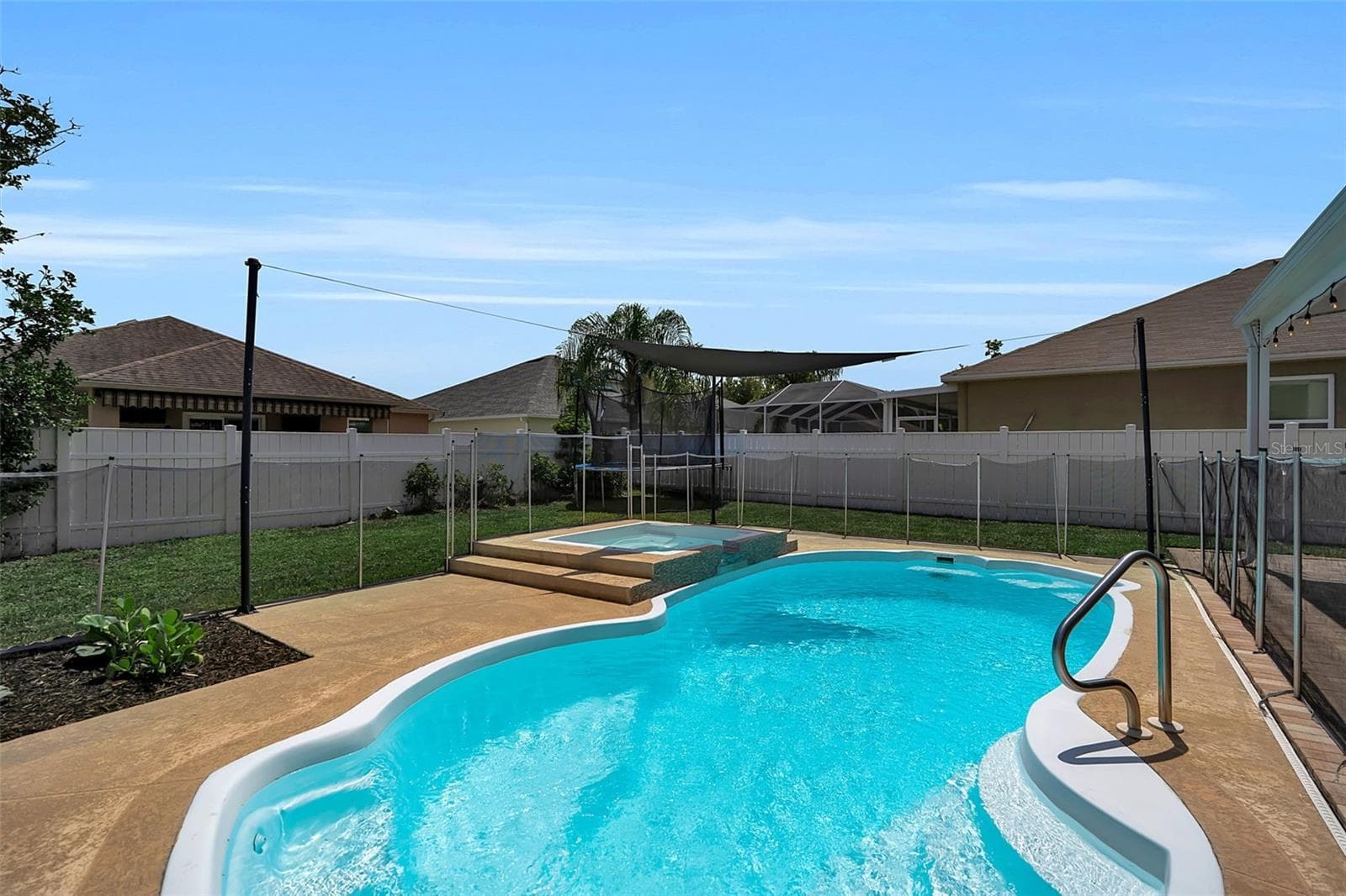 Sparkling blue pool and spa - 1250 LORETTO CIR, ODESSA