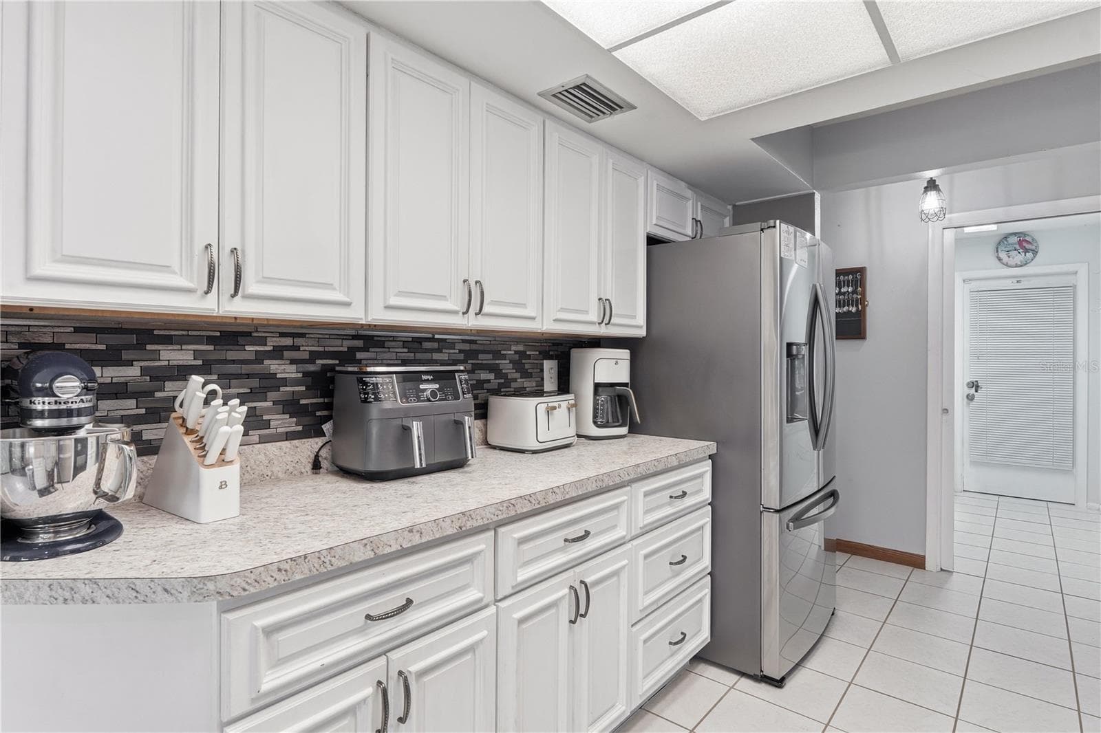 Kitchen Features Ample Counter & Storage Space - 2284 BROAD RANCH DR, PORT CHARLOTTE