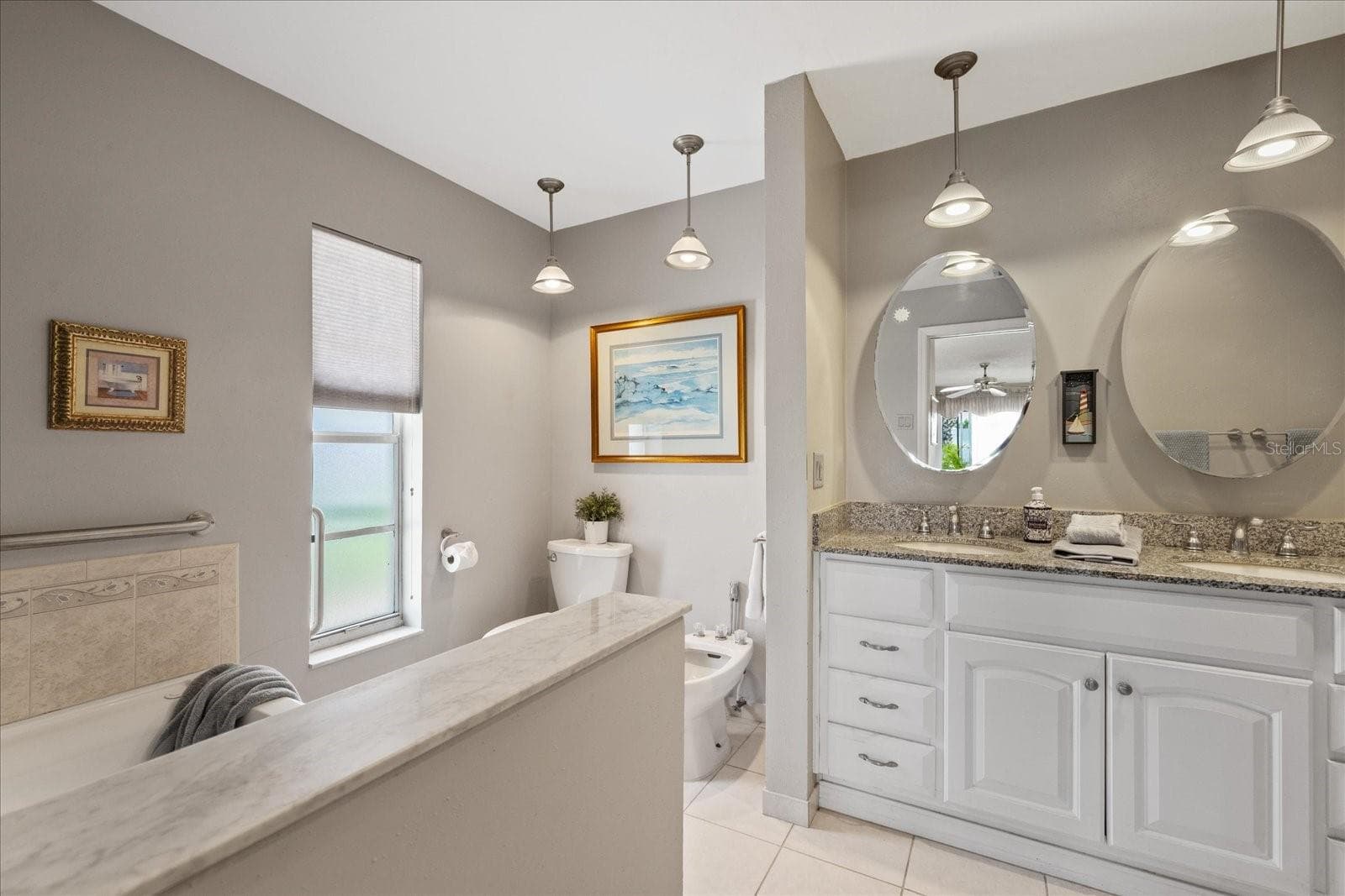 Primary en-suite with dual vanity, jetted garden tub, walk in shower and toilet and bidet. (bidet in not working) - 3154 TRIDENT TER, NEW PORT RICHEY