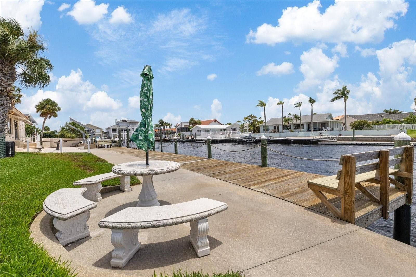 Built in concrete table and seating - 3154 TRIDENT TER, NEW PORT RICHEY