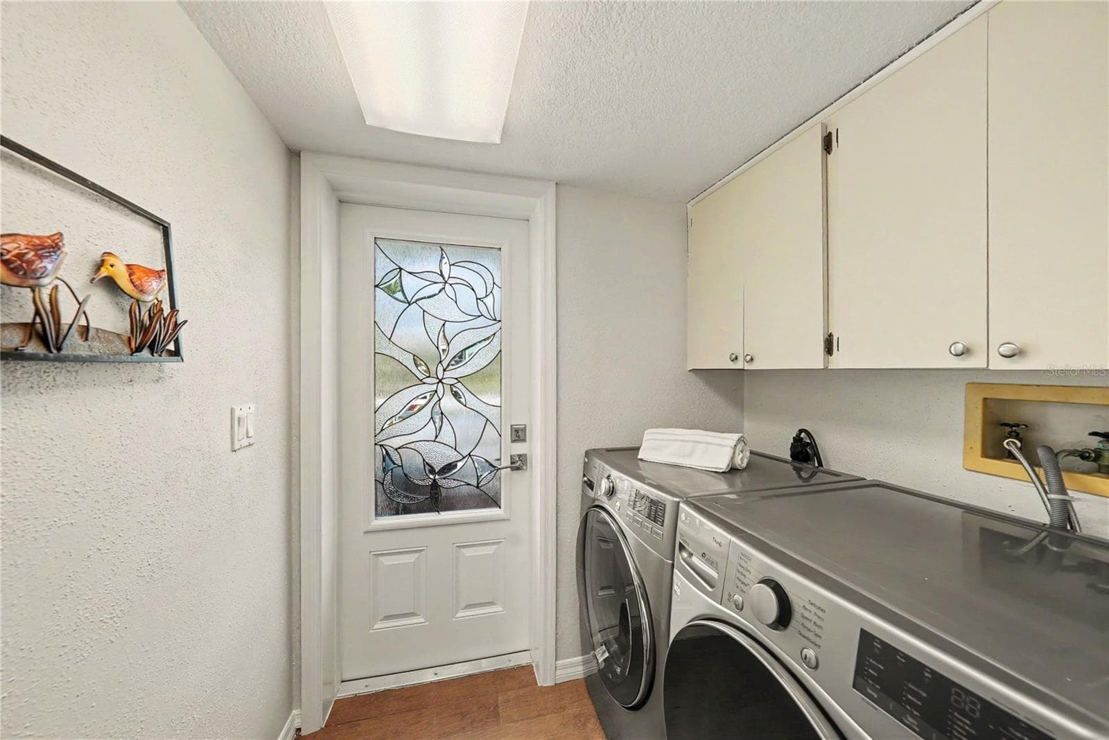 Second level private laundry with access to front balcony - 19936 GULF BLVD, INDIAN SHORES