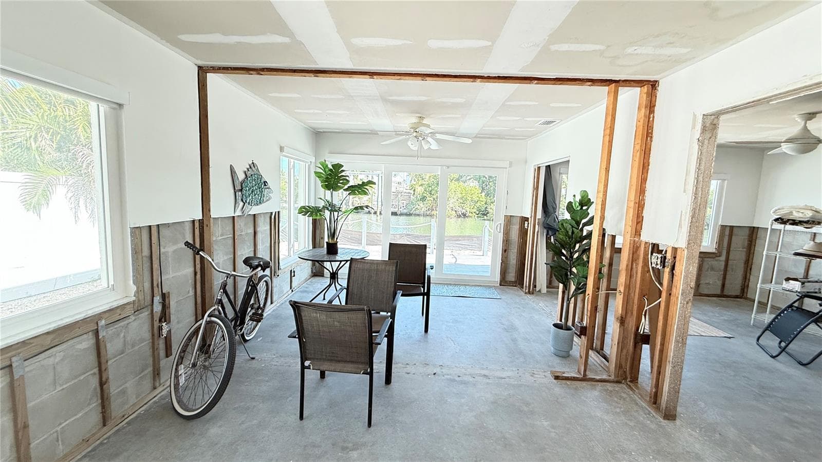 Living area looking toward canal with bedrooms off to the right - 420 63RD ST #420A, HOLMES BEACH