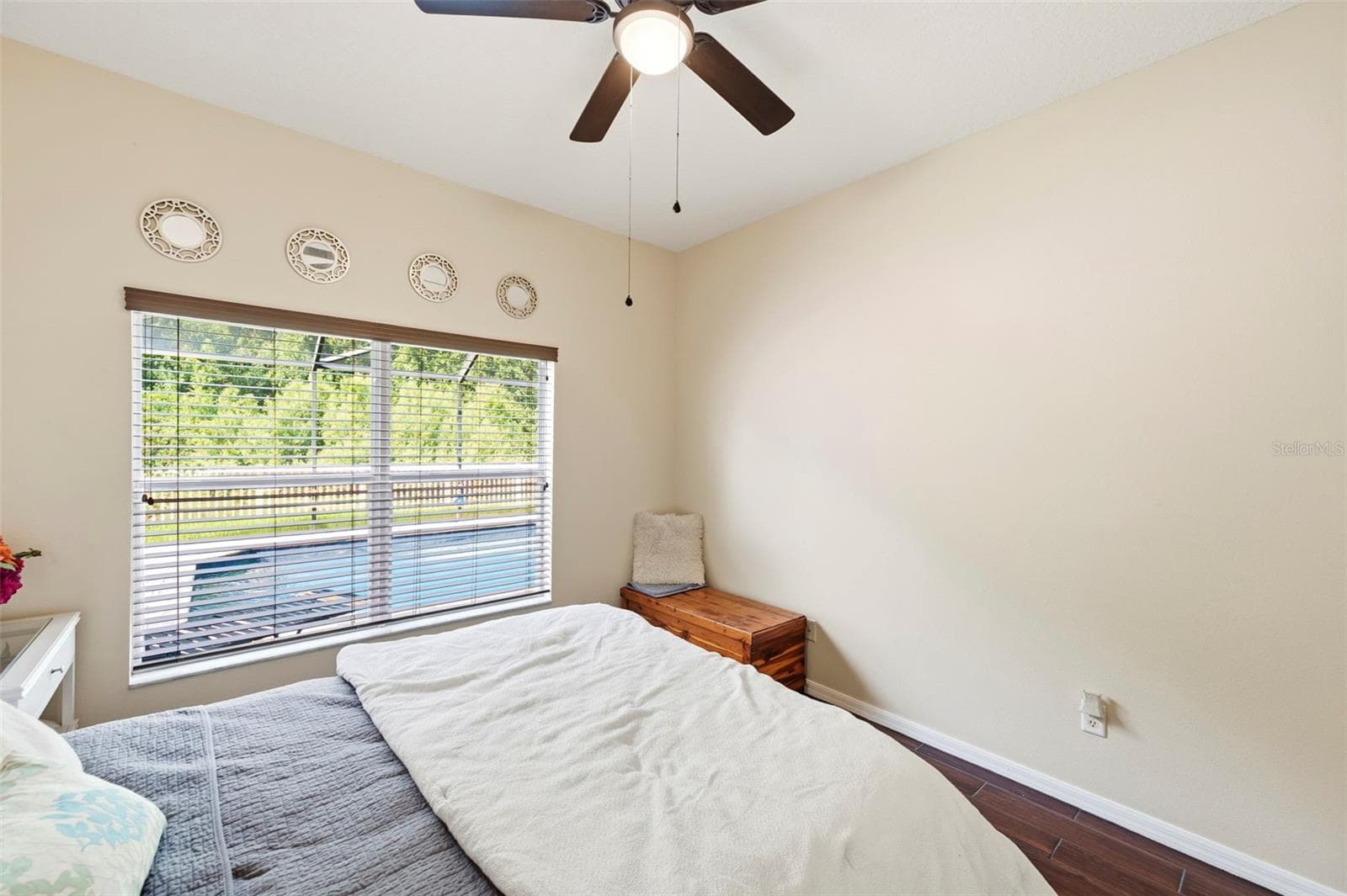 Bedroom has pool view. - 11507 BELLE HAVEN DR, NEW PORT RICHEY