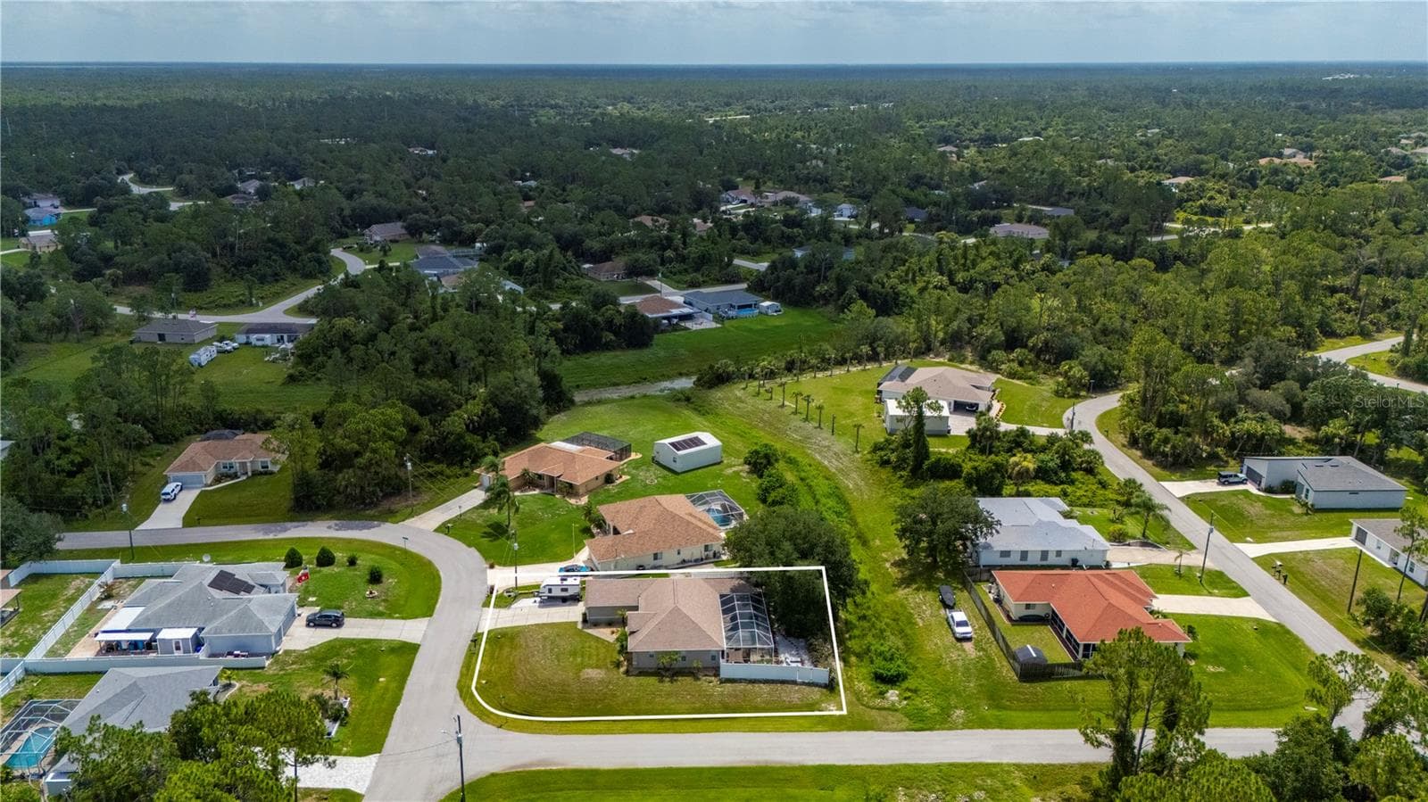 Perfect location and beautiful pool home on oversized lot. Privacy fence and greenbelt area allows relaxing privacy. - 5615 MOJAVE AVE, NORTH PORT