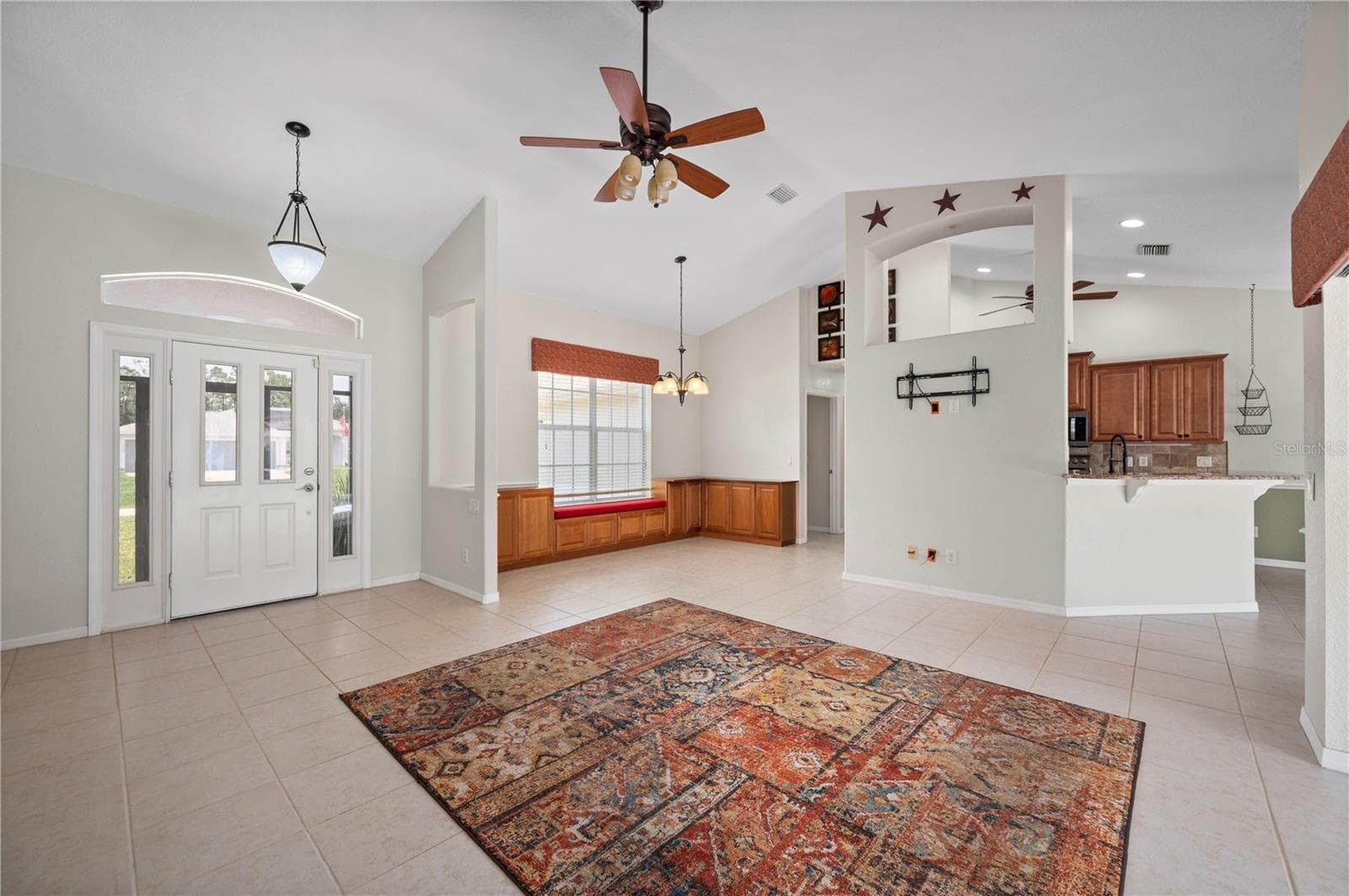 From living room and enjoy this dining room with built in cabinetry. - 5615 MOJAVE AVE, NORTH PORT