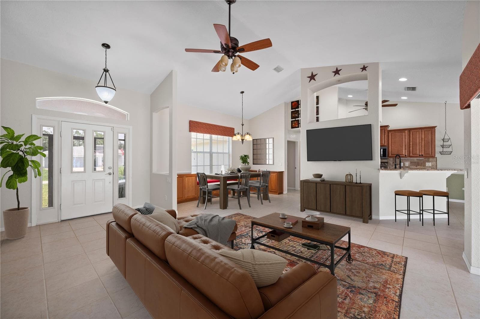 Virtually staged Living Room and Dining Room - 5615 MOJAVE AVE, NORTH PORT