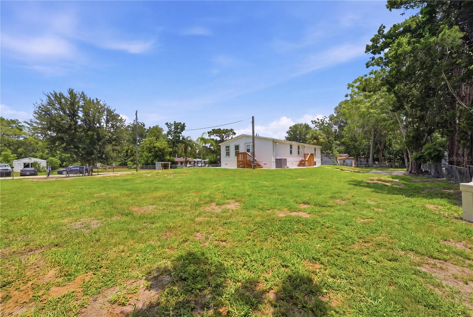 1/2 acre fully fenced - 7904 CADILLAC AVE, HUDSON
