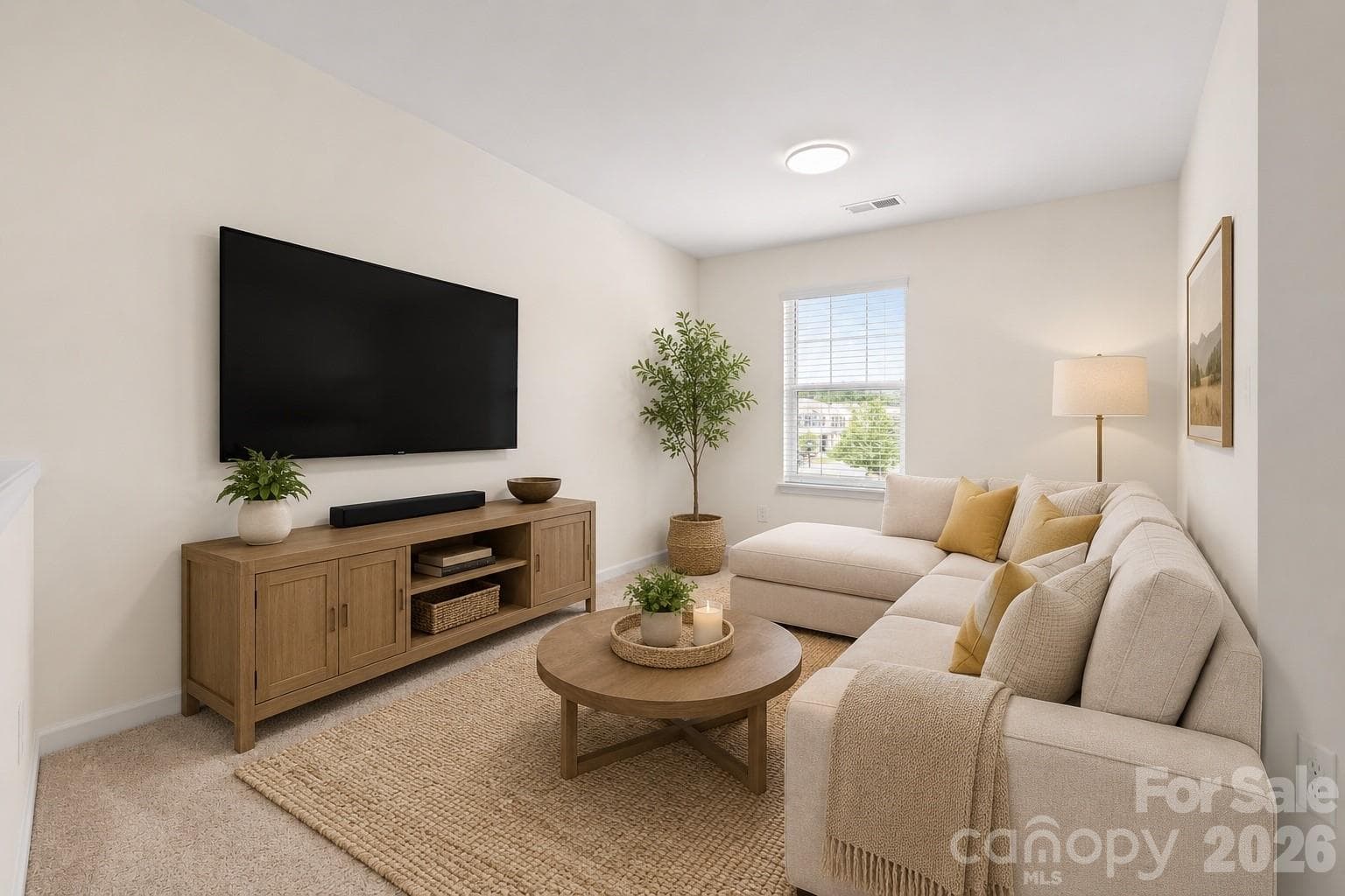 Virtually staged as a living room/media room - 5516 John Mcdowell Place, Charlotte