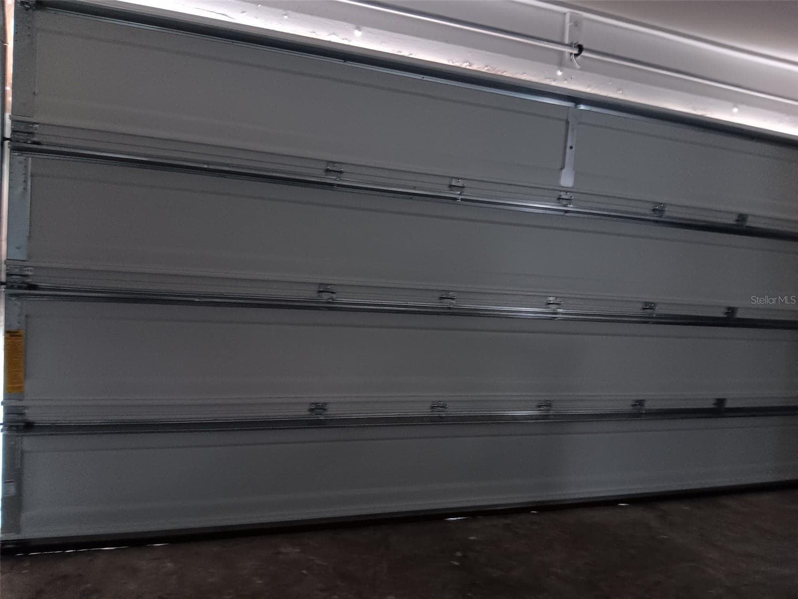 Brand New hurricane rated garage door - 9022 LINGROVE RD, WEEKI WACHEE