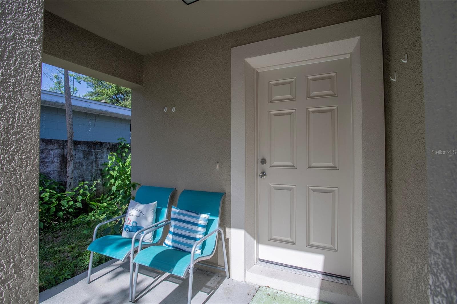Covered front porch - 1202 S DEWEY ST, EUSTIS