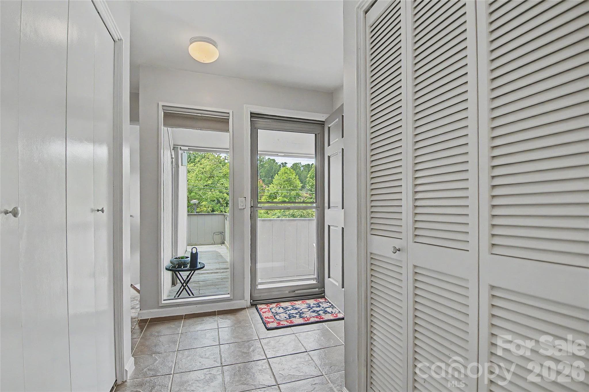 Hallway w/Storage - 8 Lakemoor Lane, Hendersonville