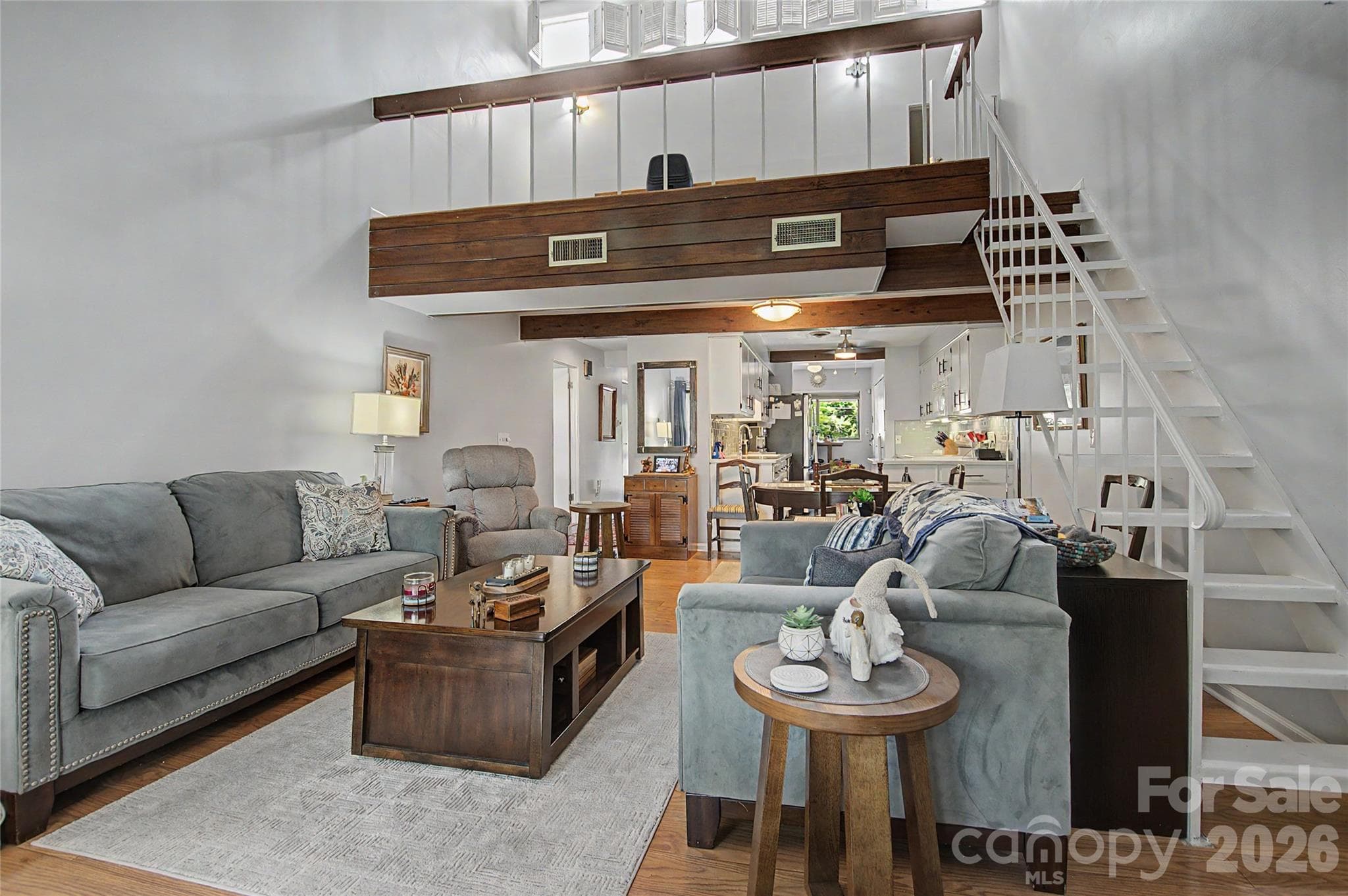 Living Room and Stairs to Loft - 8 Lakemoor Lane, Hendersonville