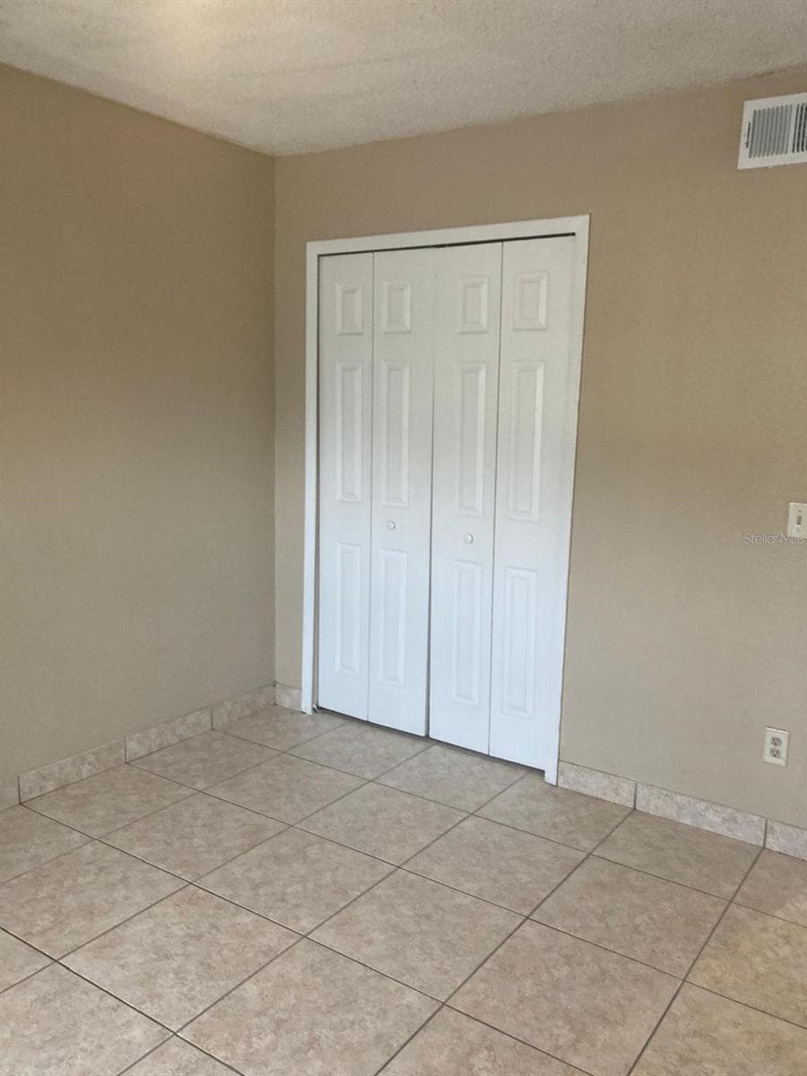 Condominium at 9911 TURF CT #2, ORLANDO, photo 9 of 12