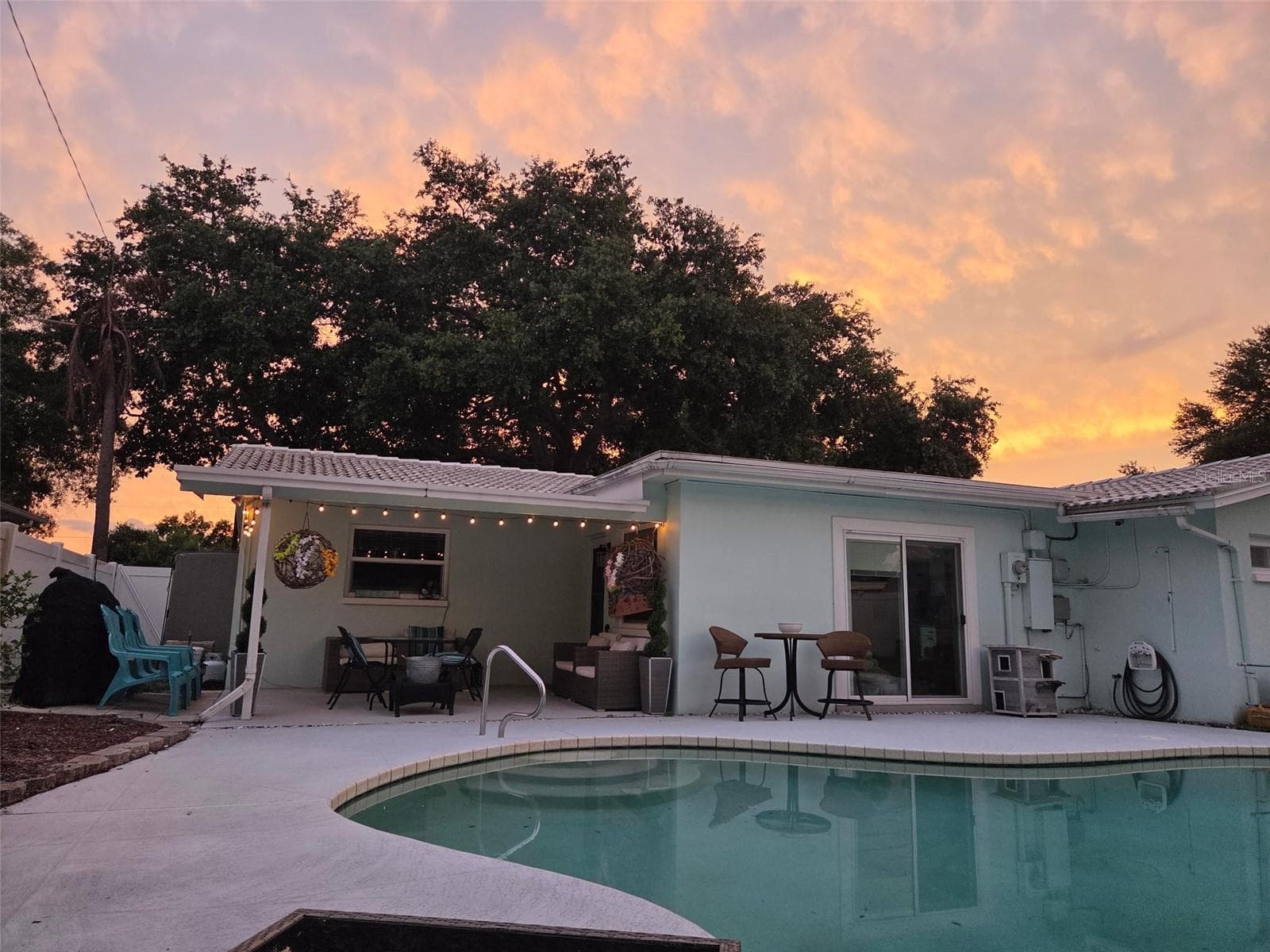 Covered patio area to pool and family room - 704 23RD ST SW, LARGO