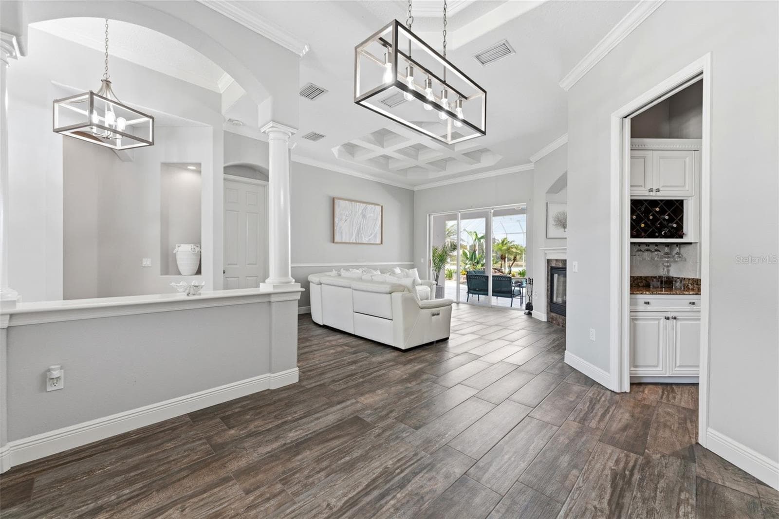 Open Concept Formal Living & Dining Room With Stunning Views From Every Angle - 24355 HIDEOUT TRL, LAND O LAKES
