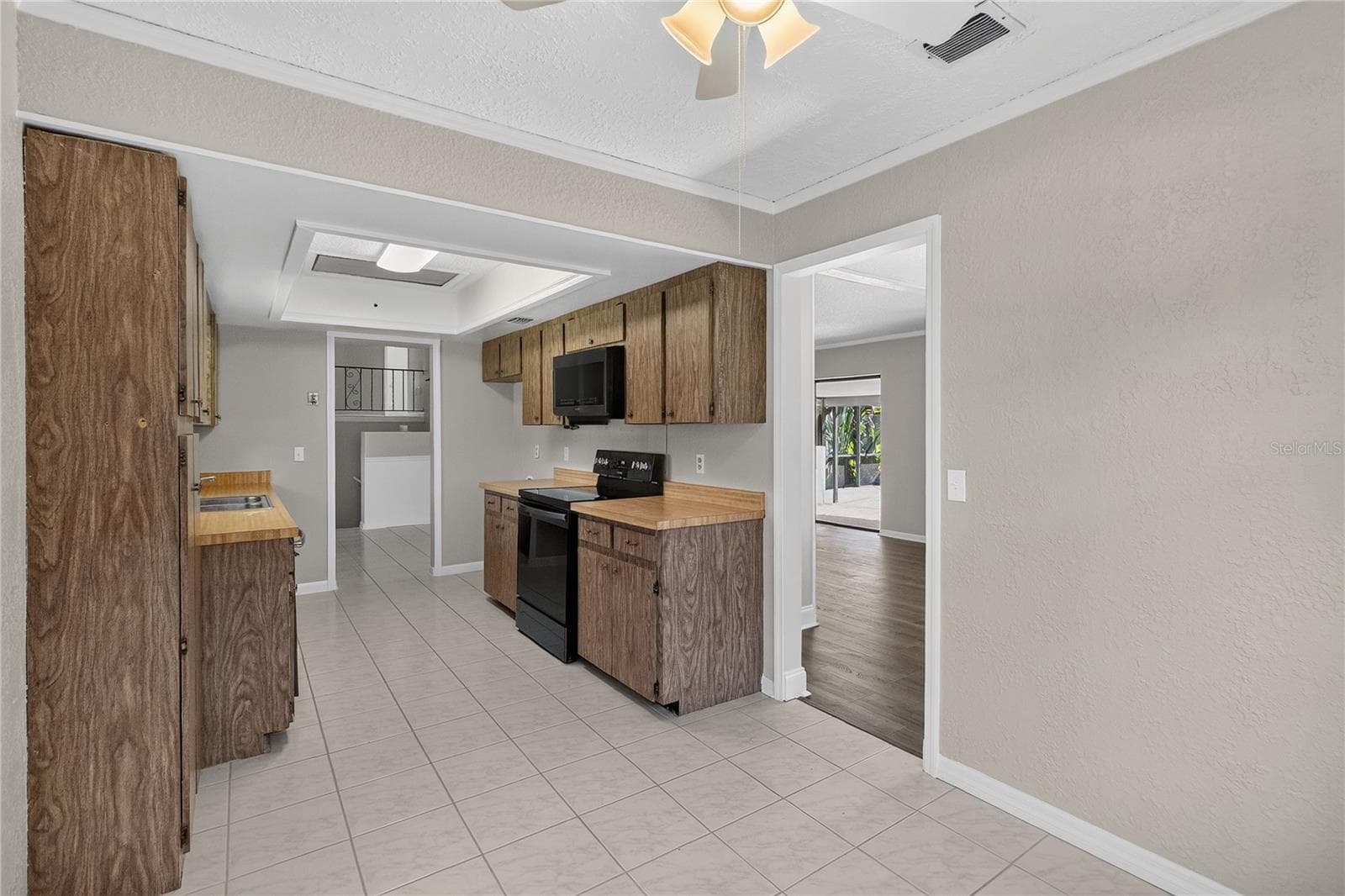 View 2 - Kitchen from angle of eat-in dinette area. Doorway shown to Dining Room - 656 LITTLE WEKIVA RD, ALTAMONTE SPRINGS