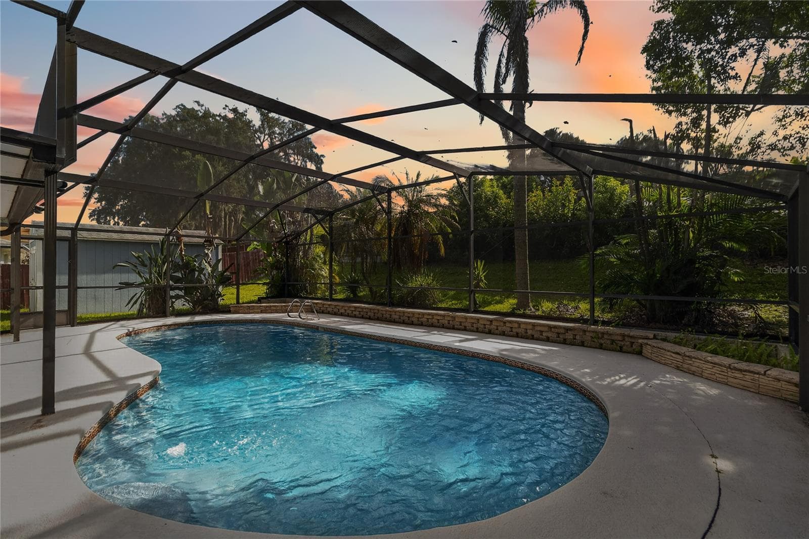 Enjoy evening sunsets and a cool summer swim OR access the pool solar panel for heated waters during a cool Florida winter. - 656 LITTLE WEKIVA RD, ALTAMONTE SPRINGS