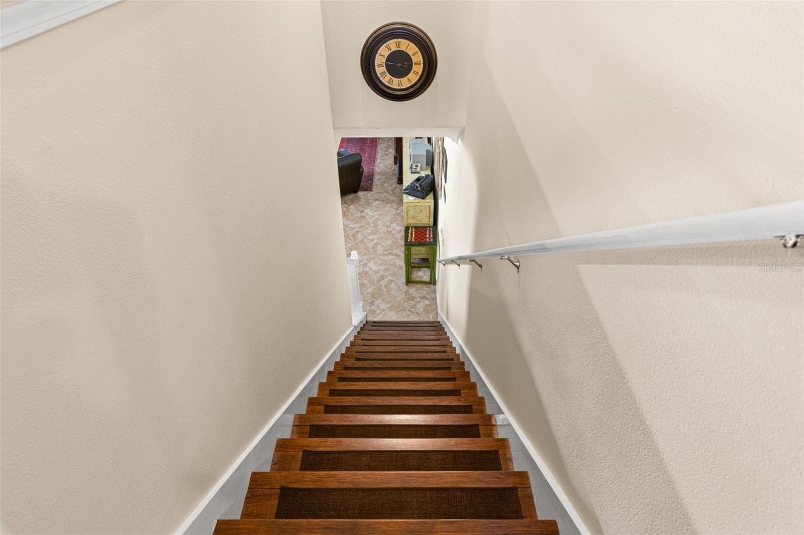 Hardwood continues up the staircase, creating a warmer, more finished look. - 9524 TRUMPET VINE LOOP, NEW PORT RICHEY