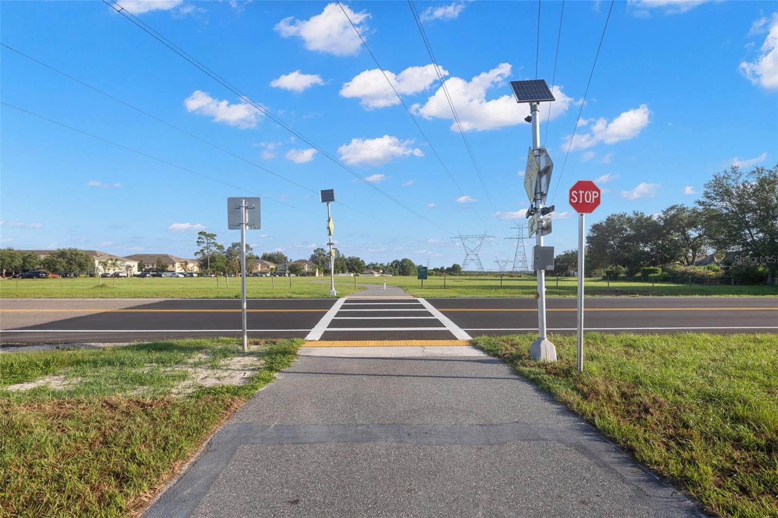 A marked crossing provides access to the nearby paved trail, connecting Trinity with the Starkey Gap and Tri-County trail system and the northern extension of the Pinellas Trail—ideal for walking, running and cycling. - 9524 TRUMPET VINE LOOP, NEW PORT RICHEY