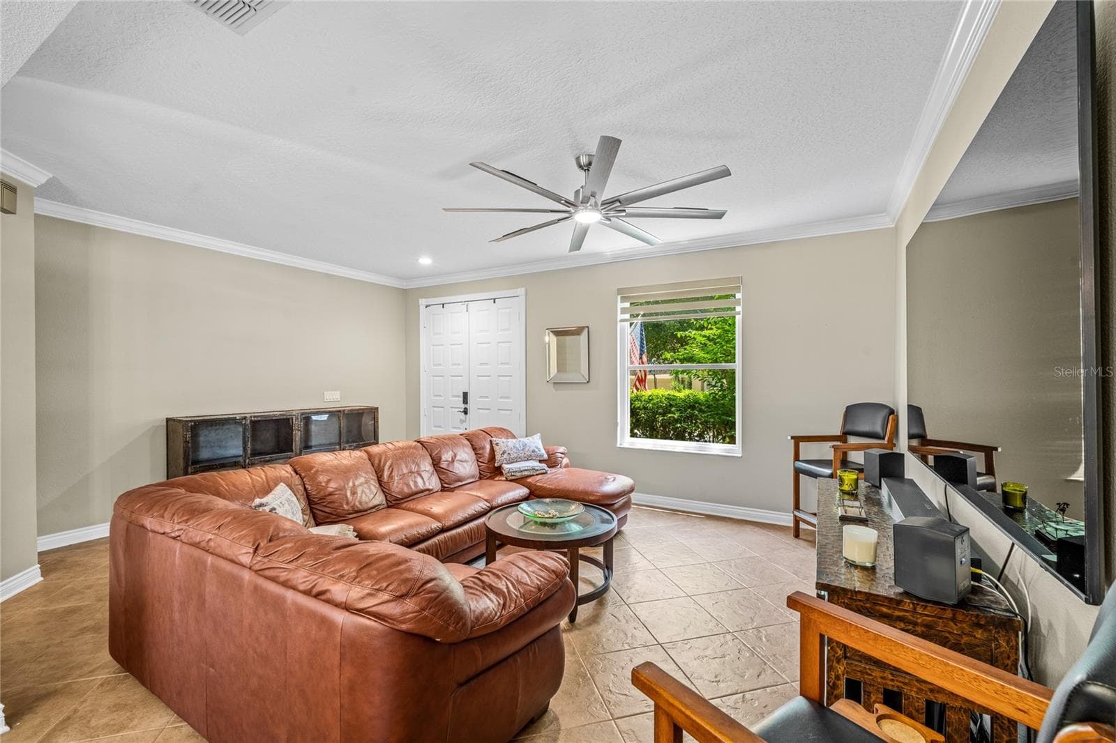 Formal family room with crown molding - 483 VIA TUSCANY LOOP, LAKE MARY
