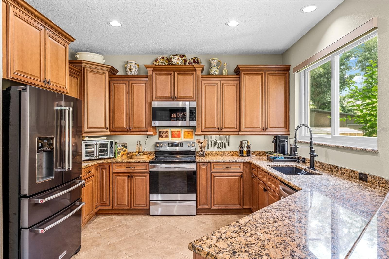 The kitchen has been fully rennovated. - 483 VIA TUSCANY LOOP, LAKE MARY