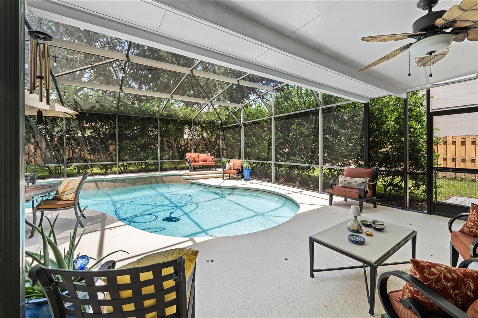 The lanai has a covered area - 483 VIA TUSCANY LOOP, LAKE MARY