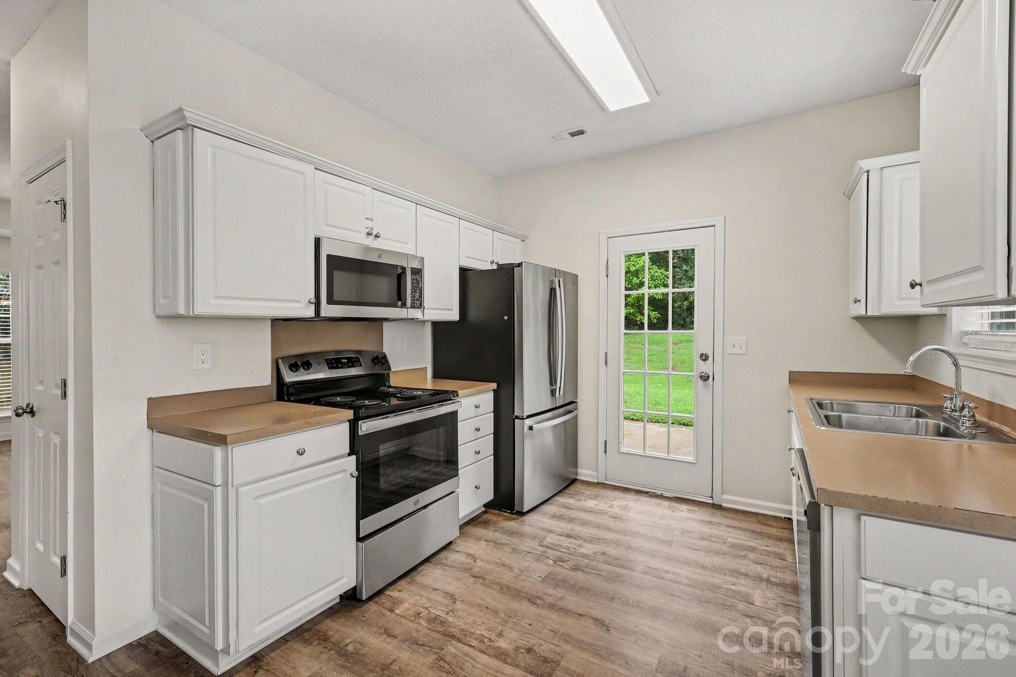 Single Family Residence at 16034 Farmall Drive, Huntersville, photo 11 of 24