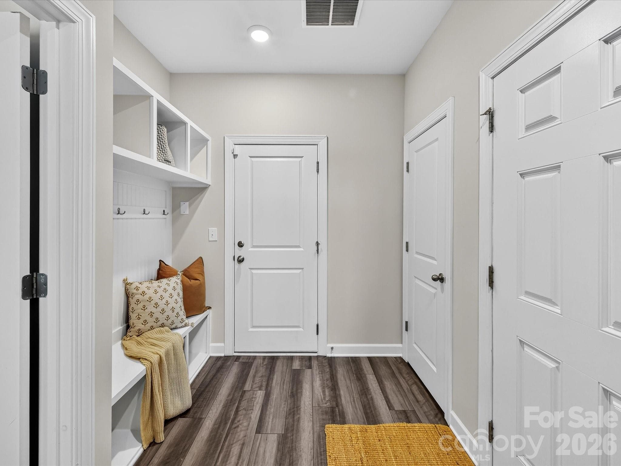 Spacious foyer welcomes you with durable luxury flooring, high ceilings, and a bright, open feel. - 4552 Millennium Avenue, Charlotte