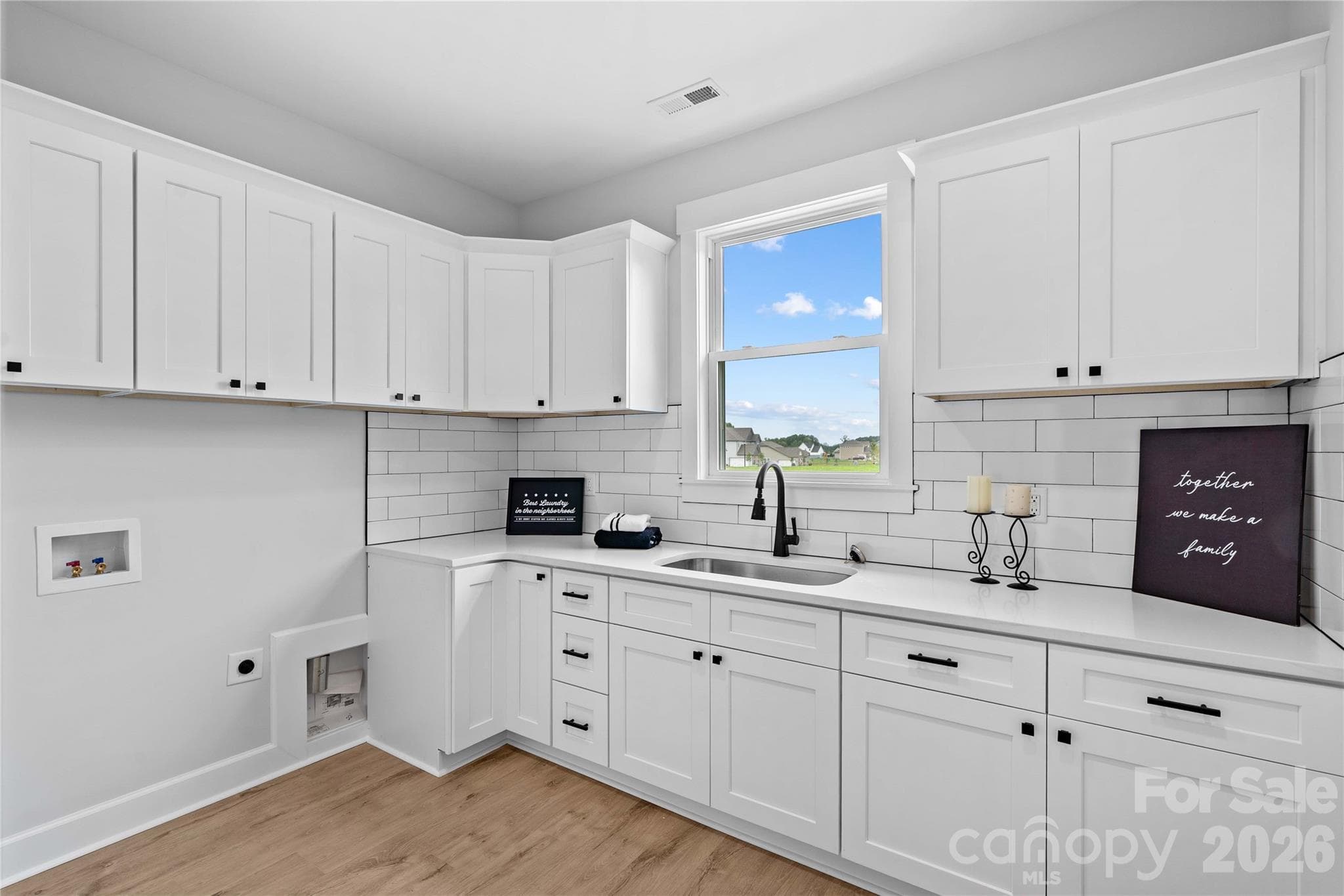 Shows how large Laundry is with utility sink & quartz counters. (No virtual staging.) - 1205 Coppergate Drive, Salisbury