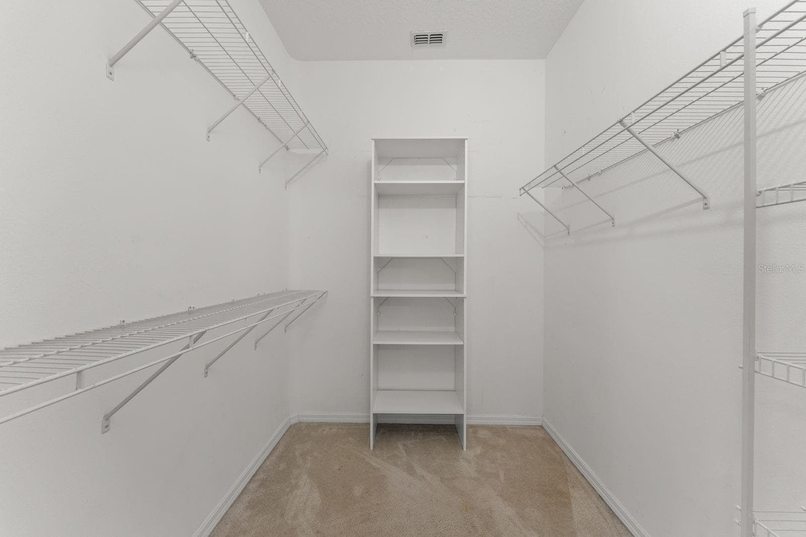 Primary Suite Walk-in Closet - 14127 SOUTHERN RED MAPLE DR, ORLANDO