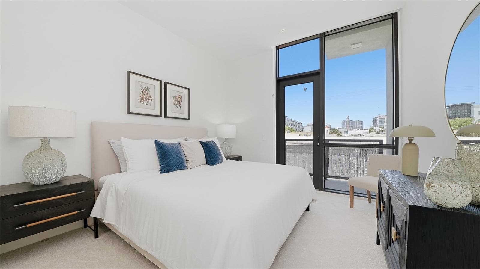 This primary suite is spacious and also light, bright which features a walk in closet and full bath with dual sinks as well as its own private west facing patio. - 430 KUMQUAT CT #202, SARASOTA