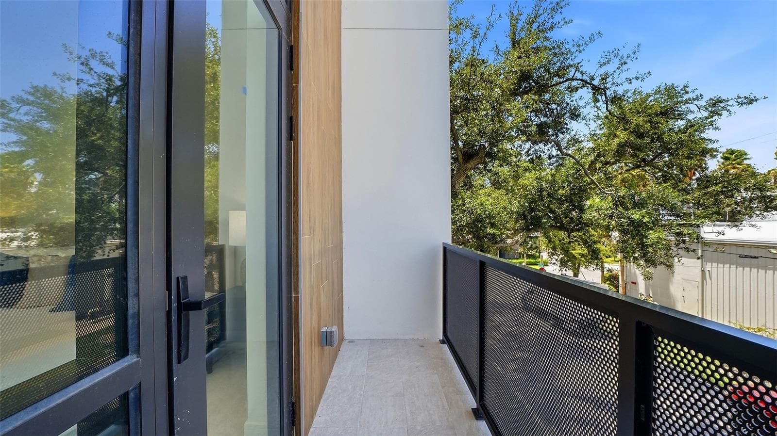 The primary suite features its own west facing private patio, in addition to a 2nd patio off the living/dining room open plan., ready to enjoy Sarasota's dramatic, colorful sunset skies. - 430 KUMQUAT CT #202, SARASOTA