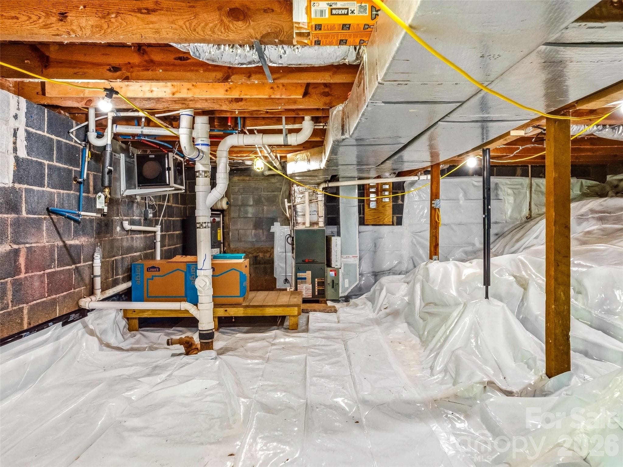 Encapsulated walk-out crawlspace with plenty of storage space! - 468 Governors View Road, Asheville