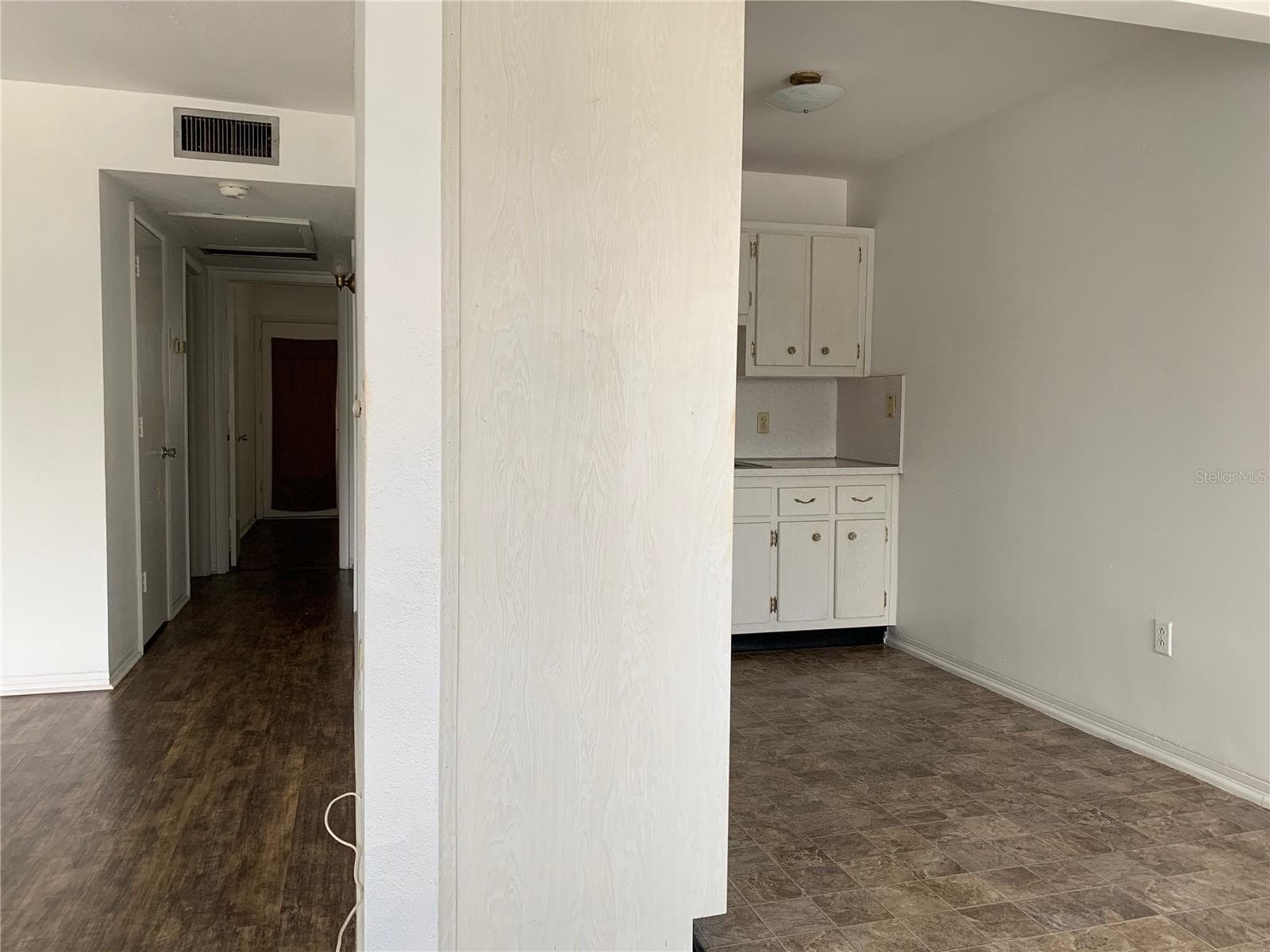Maybe a weird shot, but this shows how the kitchen backs up to the Living Room - 8126 112TH ST #203, SEMINOLE