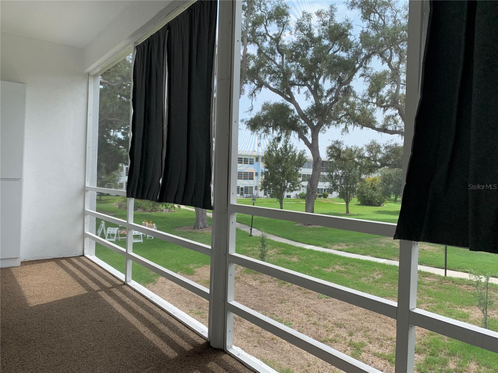 Back screened porch - 8126 112TH ST #203, SEMINOLE