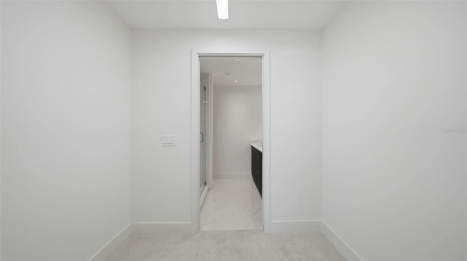 Primary suite features a walk in closet. Just add your shelving! - 430 KUMQUAT CT #202, SARASOTA