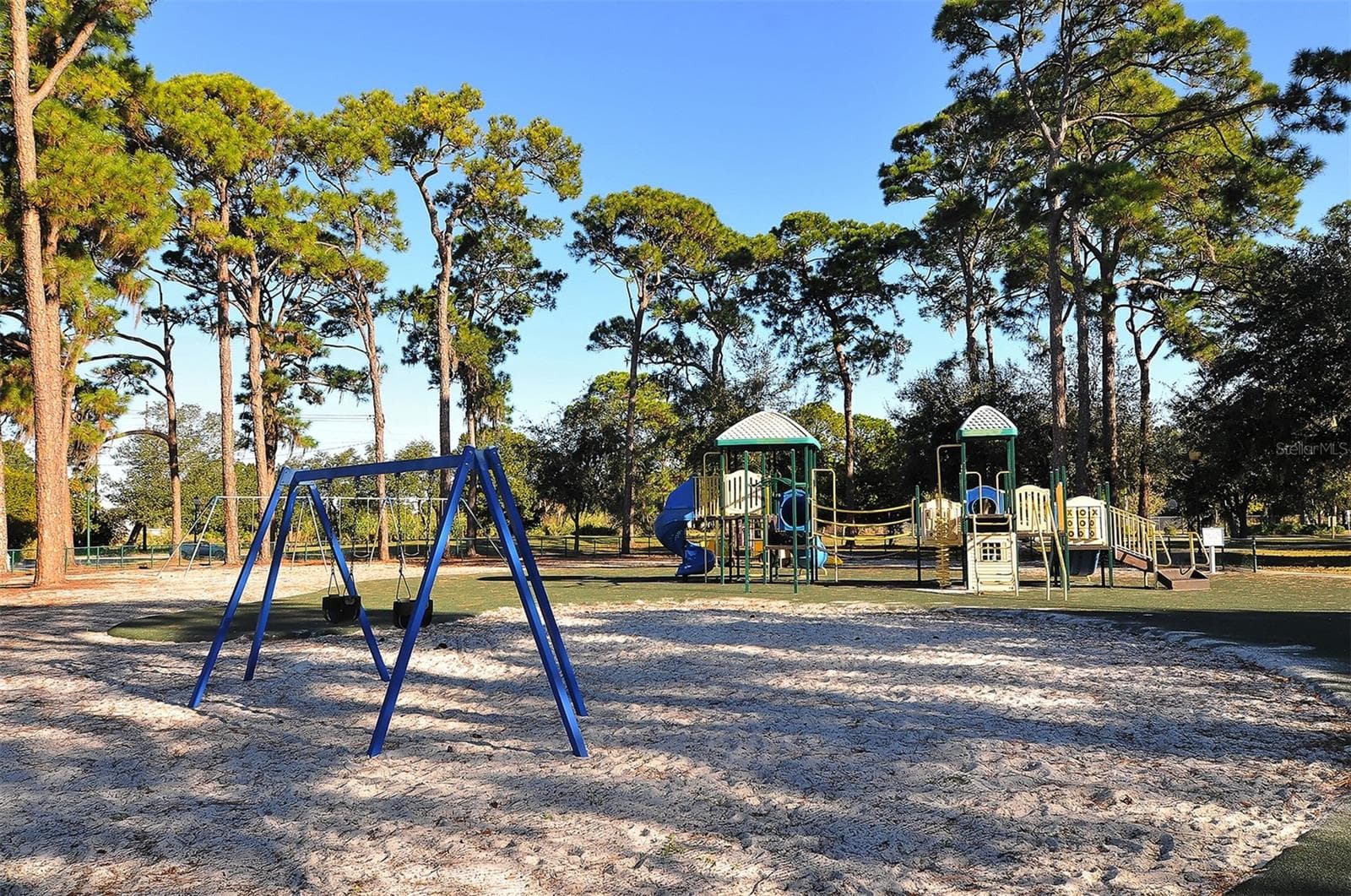 Don't miss out on a visit to 10 acre city run Gillespie Park with playground, basketball, tennis and pickleball courts, pond and walking trails and fenced in leash free CANINE CLUB for the pooches! - 430 KUMQUAT CT #202, SARASOTA