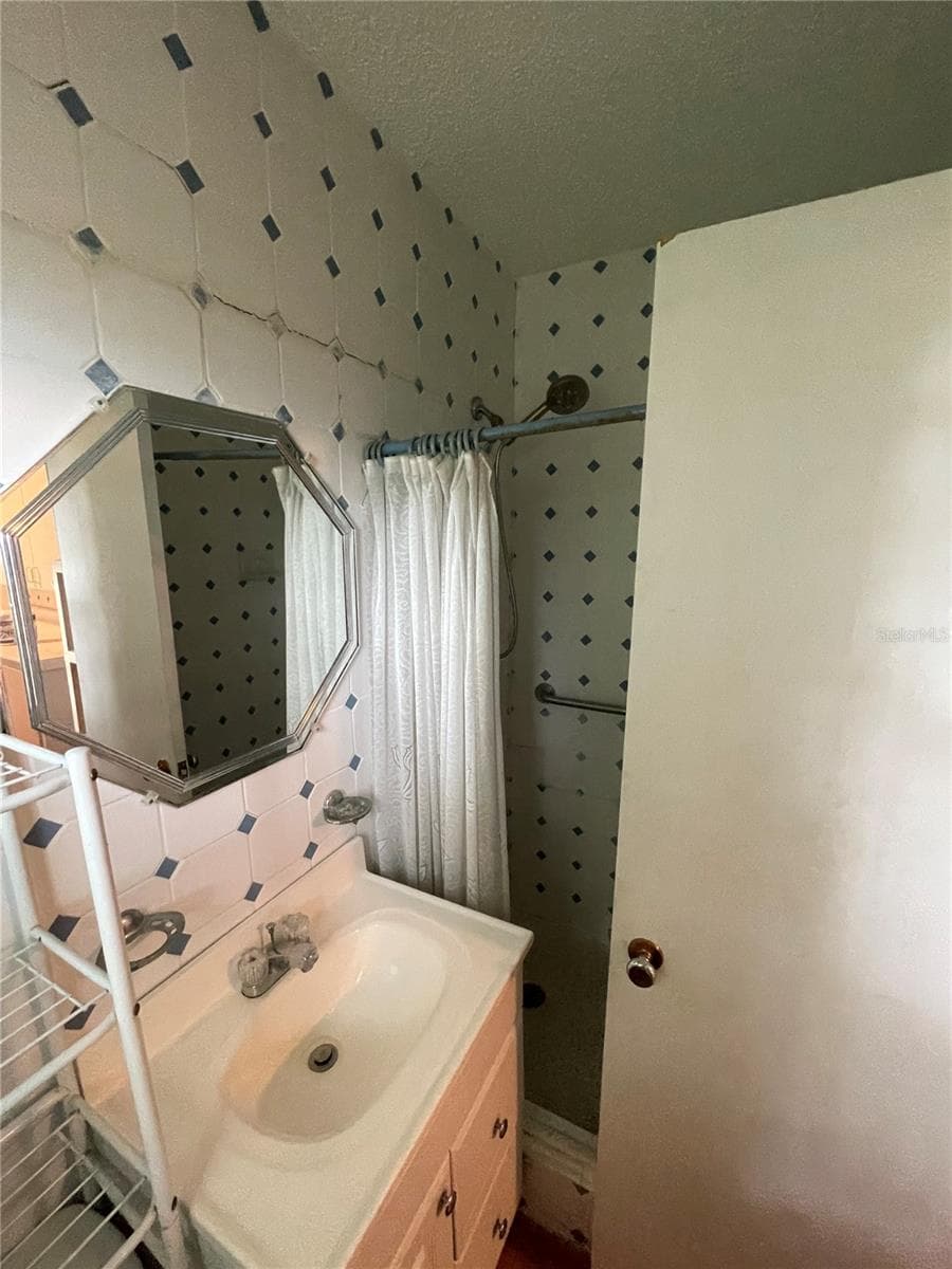 Single Family Residence at 635 DEVILLE DR E, LARGO, photo 13 of 15