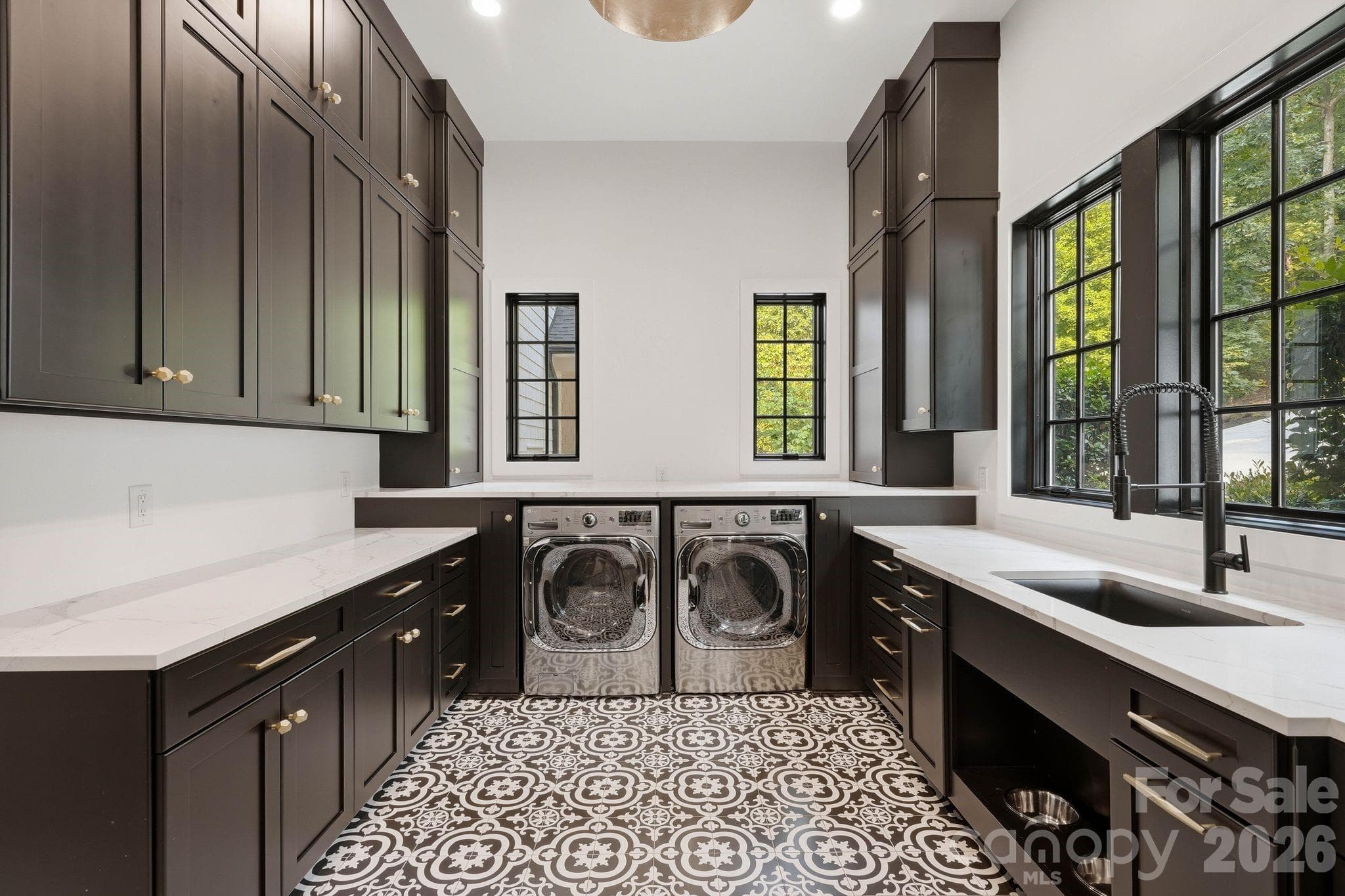 Main level laundry room and drop zone. - 13702 Sage Thrasher Lane, Charlotte