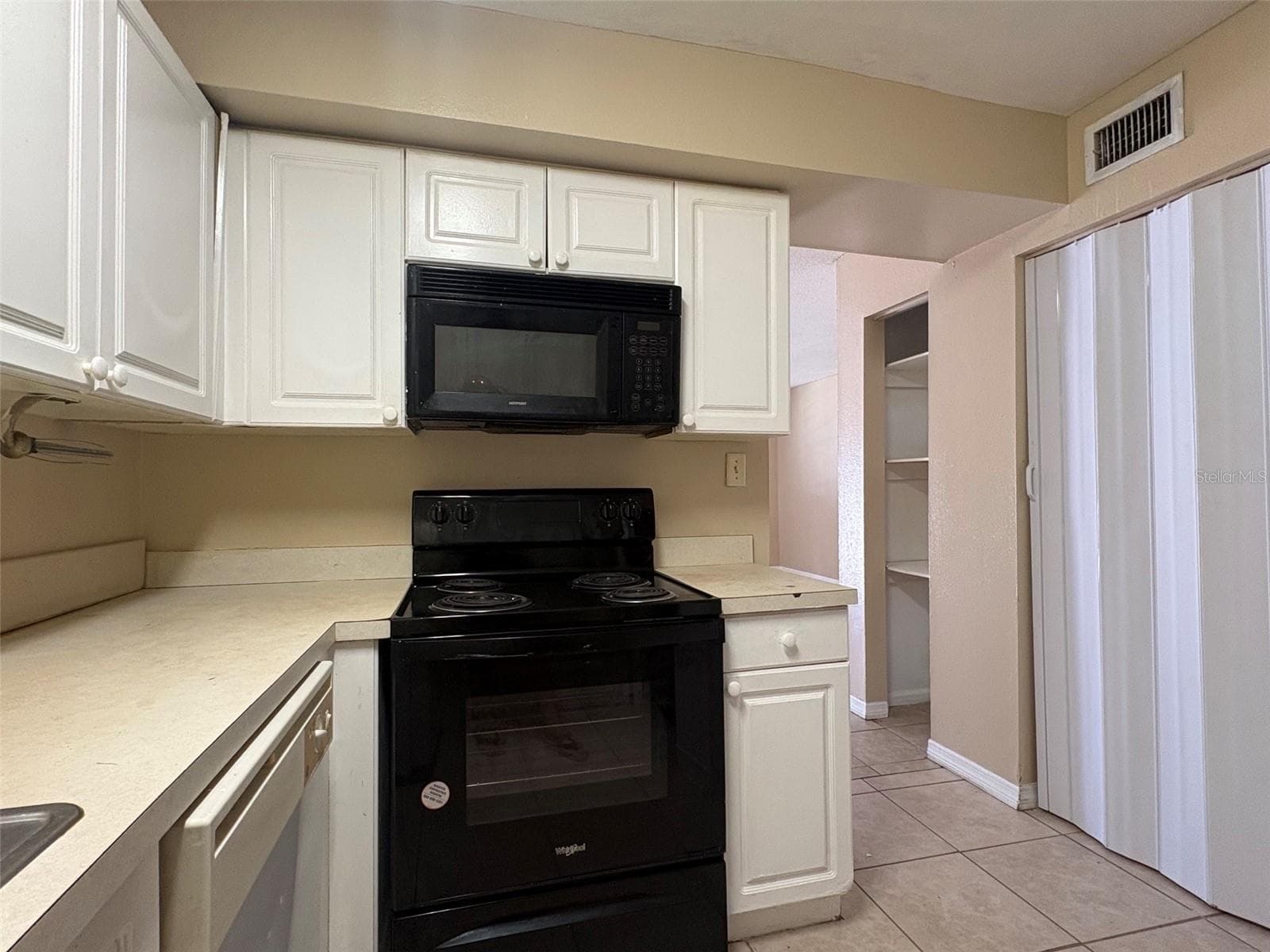 Condominium at 203 POINSETTIA PINE CT #102, TAMPA, photo 6 of 17