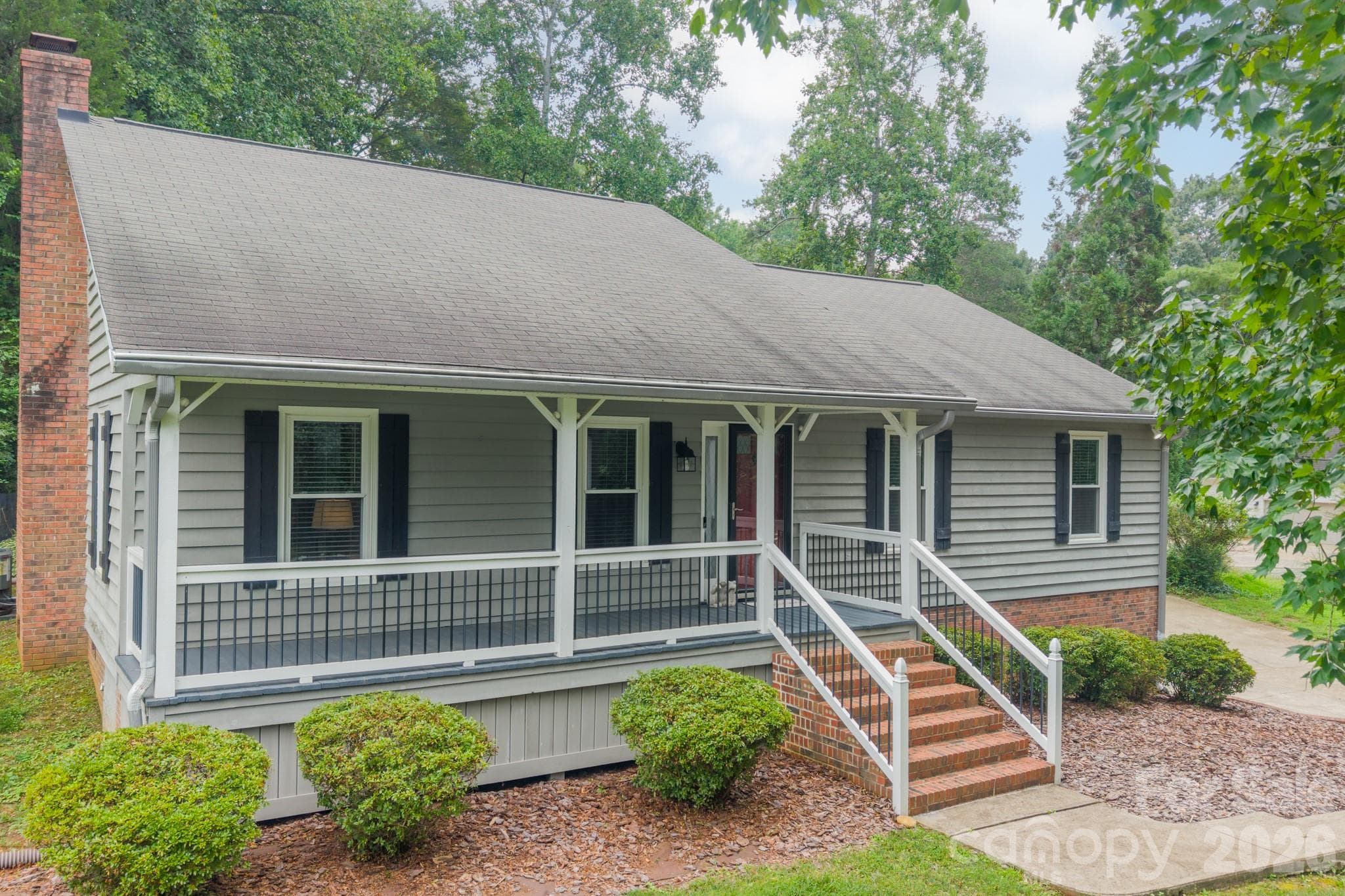Single Family Residence at 7400 Sample Road, Huntersville, photo 2 of 37