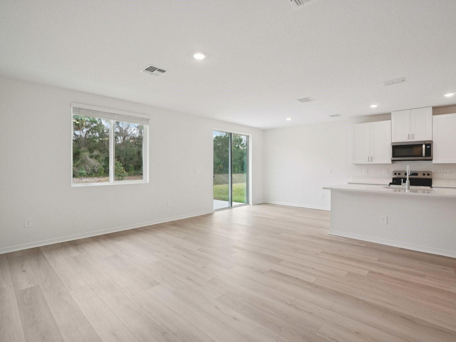 Photo is not of the actual home, but is an inspirational photo of builder’s model home and may depict options, furnishings, and/or decorator features that are not included - 17661 OLIVE THORN DR, BROOKSVILLE