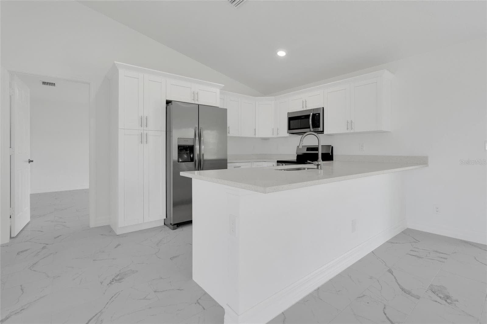 Single Family Residence at 310 NE 9TH TER, CAPE CORAL, photo 13 of 39